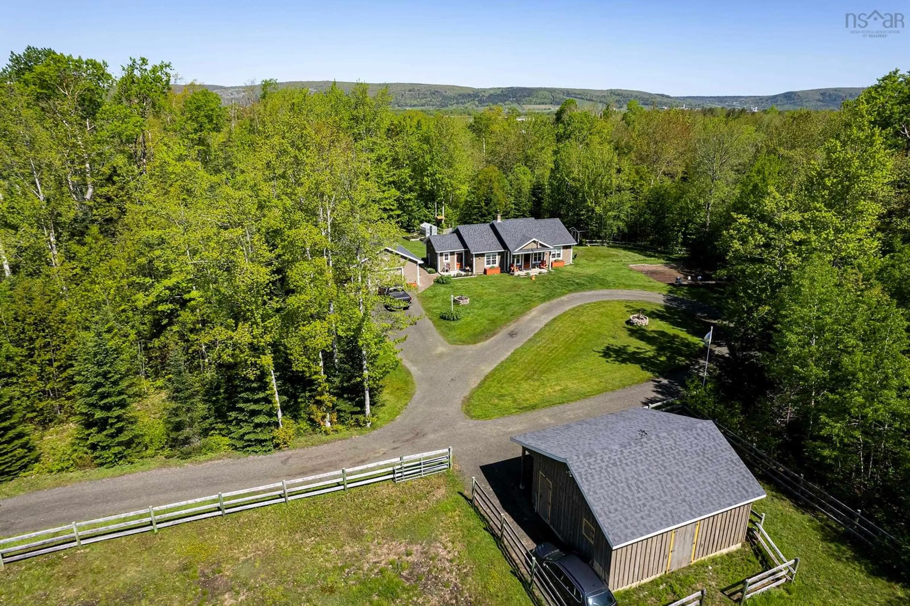 A pic from outside/outdoor area/front of a property/back of a property/a pic from drone, mountain view for 188 Fitch Rd, Lawrencetown Nova Scotia B0S 1M0