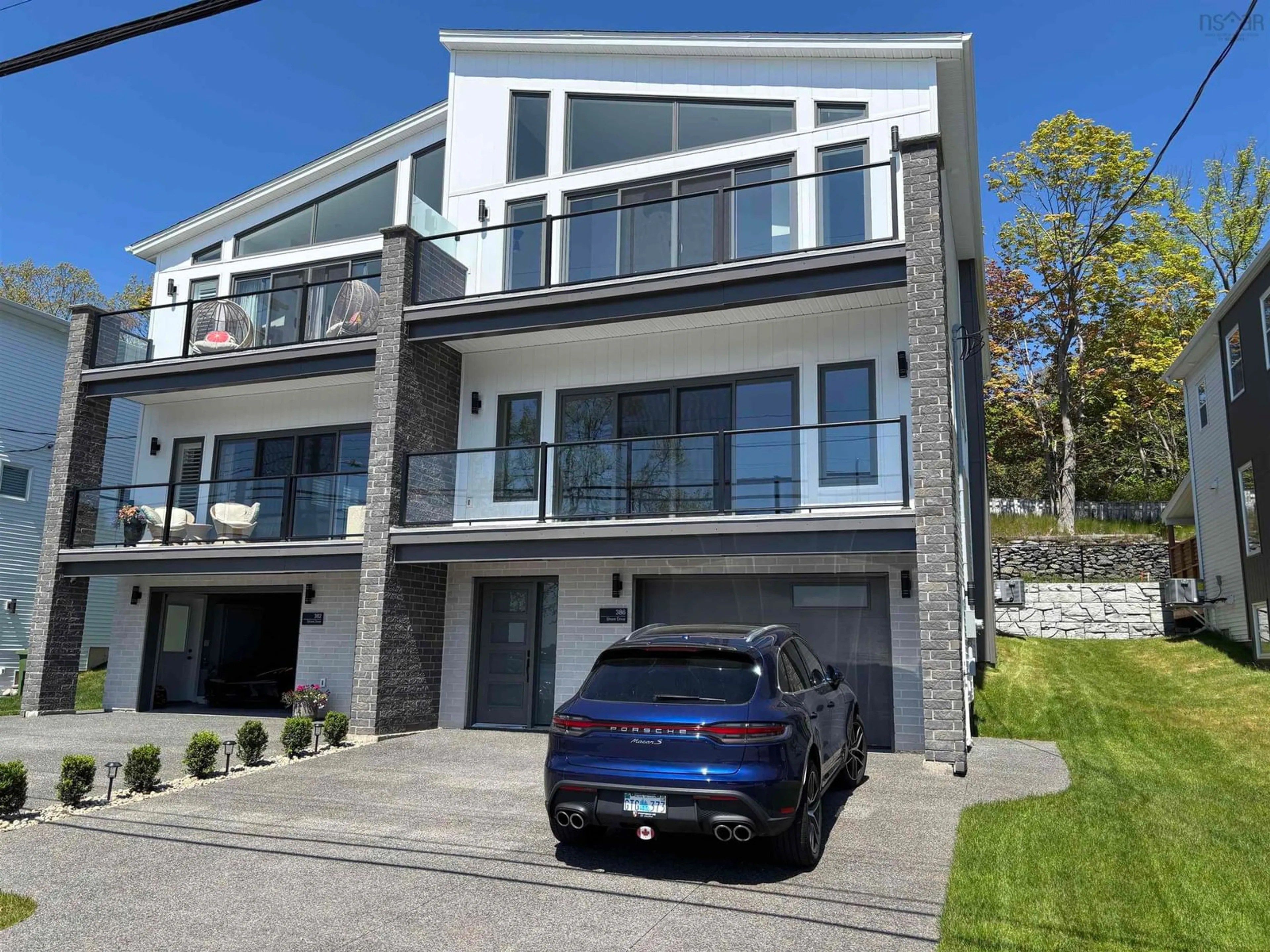 A pic from outside/outdoor area/front of a property/back of a property/a pic from drone, street for 386 Shore Dr, Bedford Nova Scotia B4C 2C7