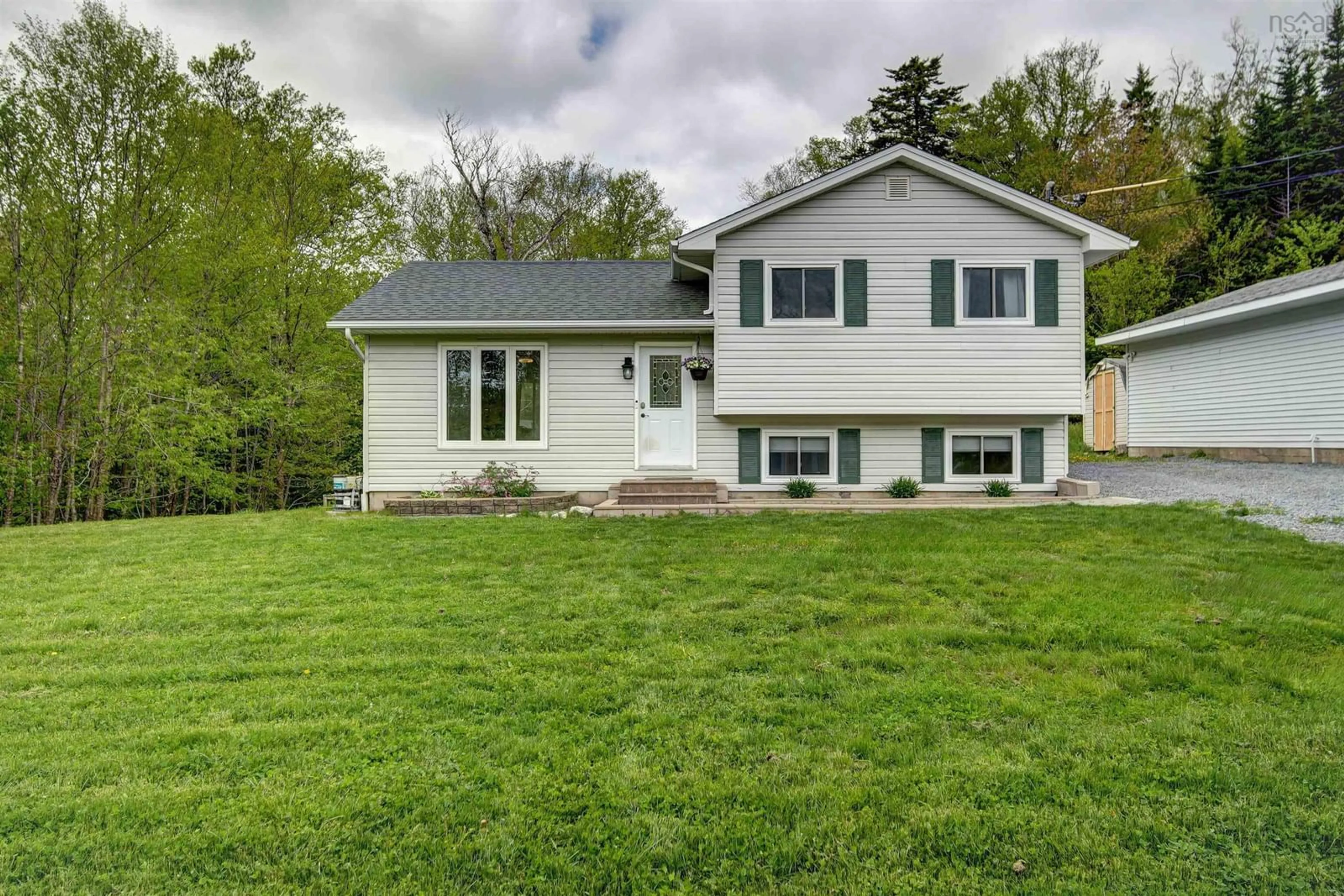 Home with vinyl exterior material, street for 20 Garrard Dr, Middle Sackville Nova Scotia B4E 3B8