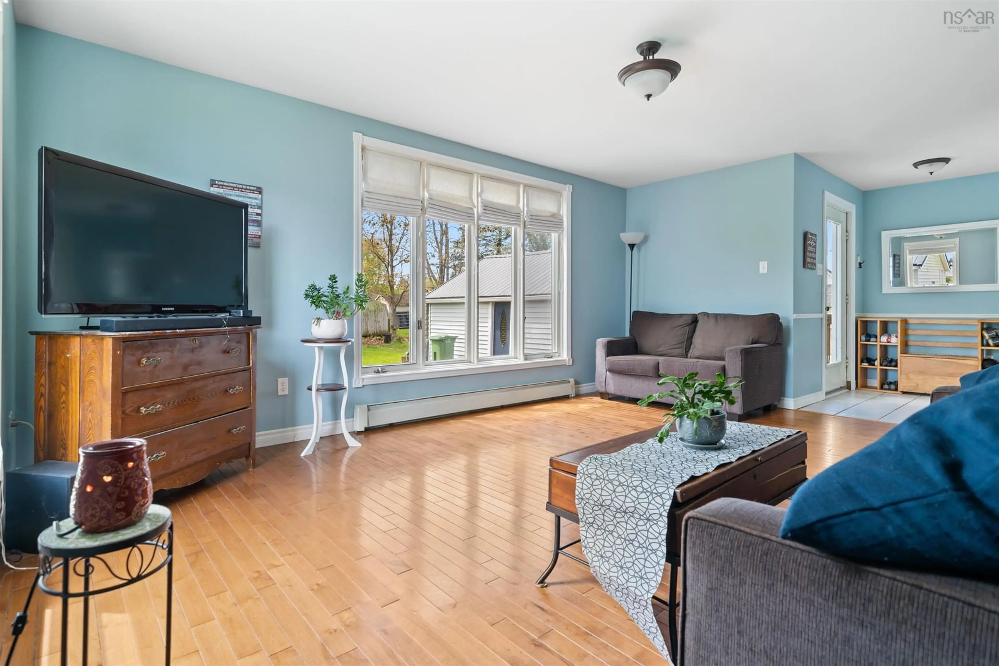 Living room with furniture, wood/laminate floor for 43 Bigney Ave, Bible Hill Nova Scotia B2N 4M1