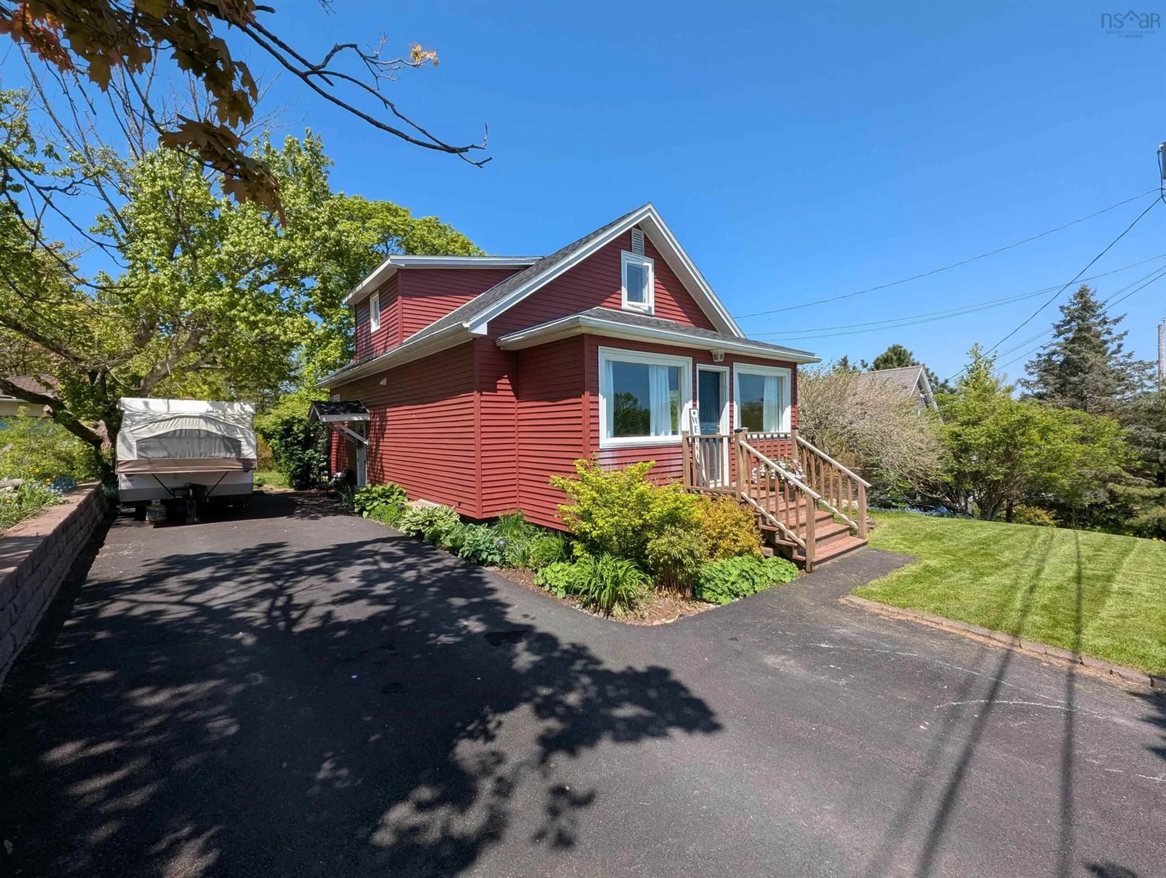 Home with vinyl exterior material, street for 11 Ettinger Hill, Shubenacadie Nova Scotia B0N 2H0