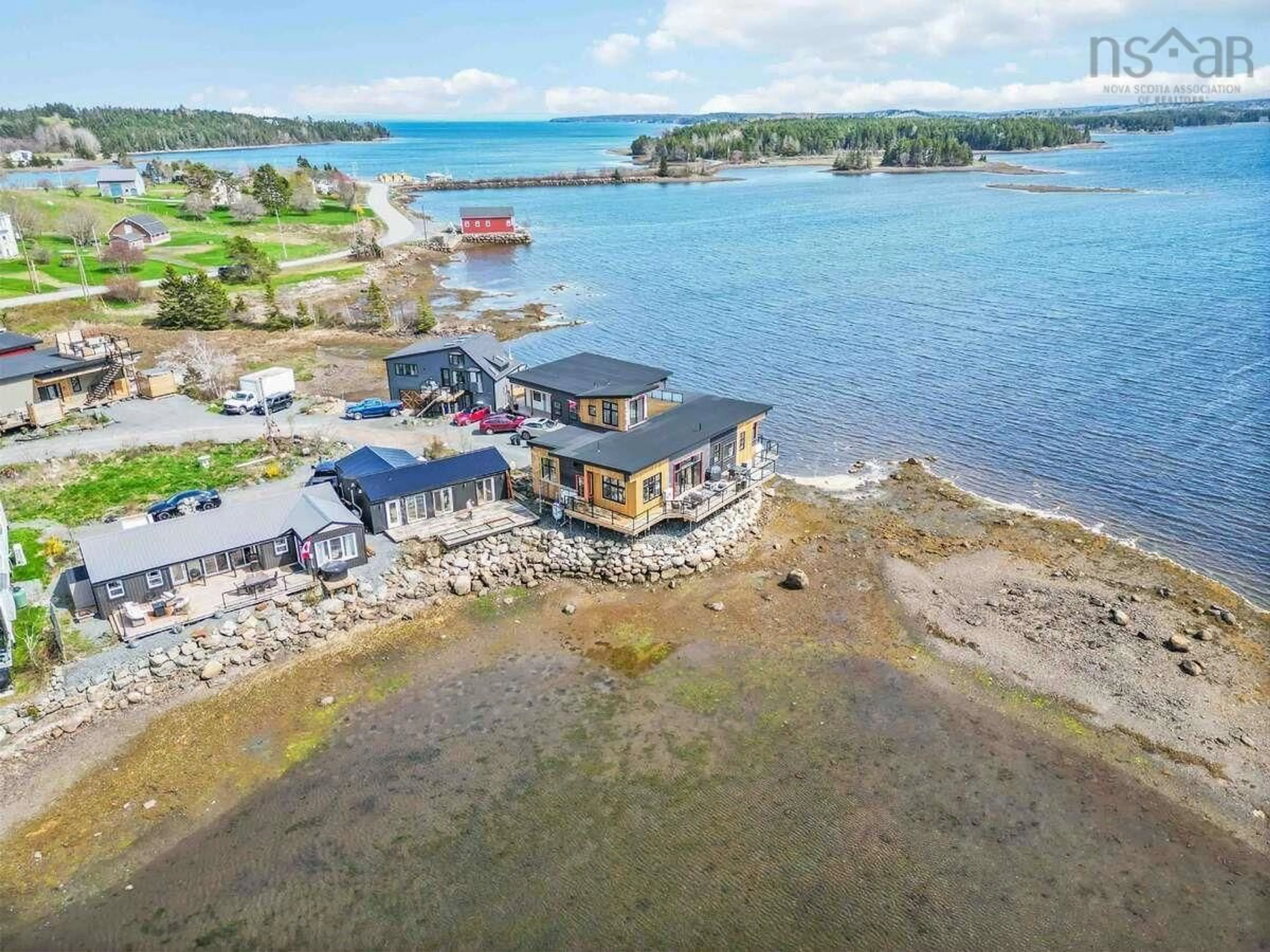 A pic from outside/outdoor area/front of a property/back of a property/a pic from drone, water/lake/river/ocean view for 693 Masons Beach Rd #5, First South Nova Scotia B0J 2C0