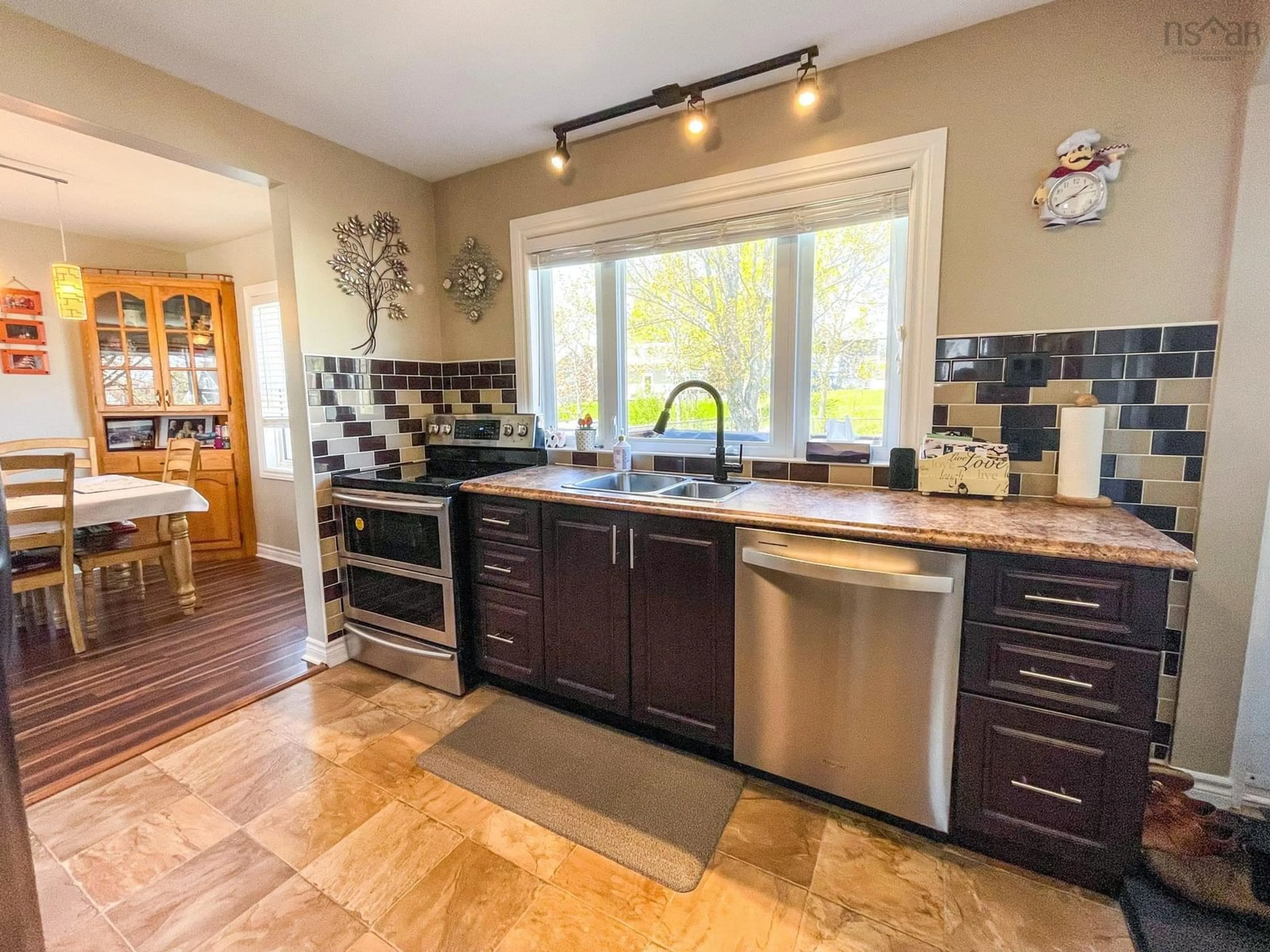 Open concept kitchen, ceramic/tile floor for 45 Avalon Dr, Sydney River Nova Scotia B1R 1P5