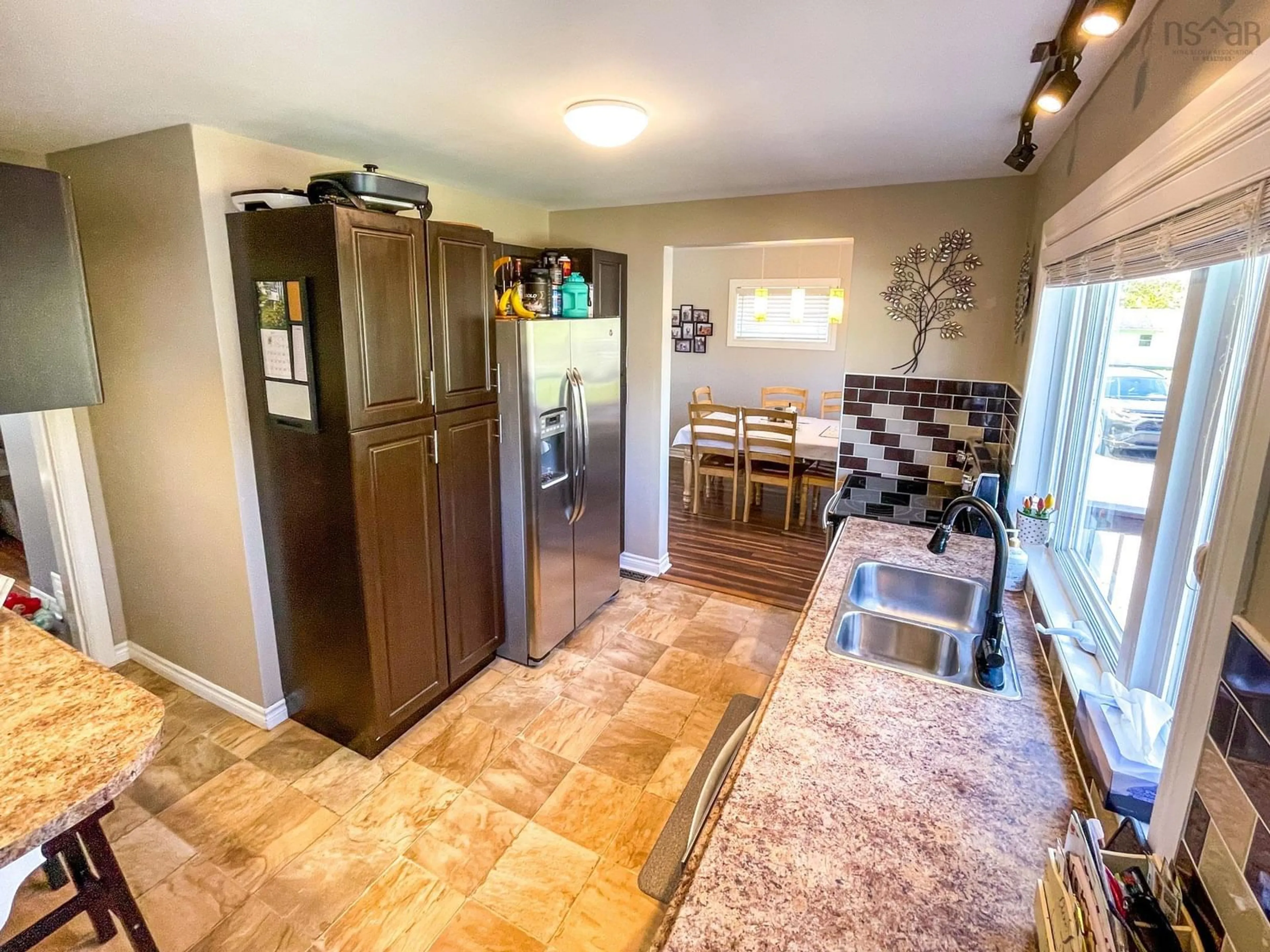 Open concept kitchen, ceramic/tile floor for 45 Avalon Dr, Sydney River Nova Scotia B1R 1P5