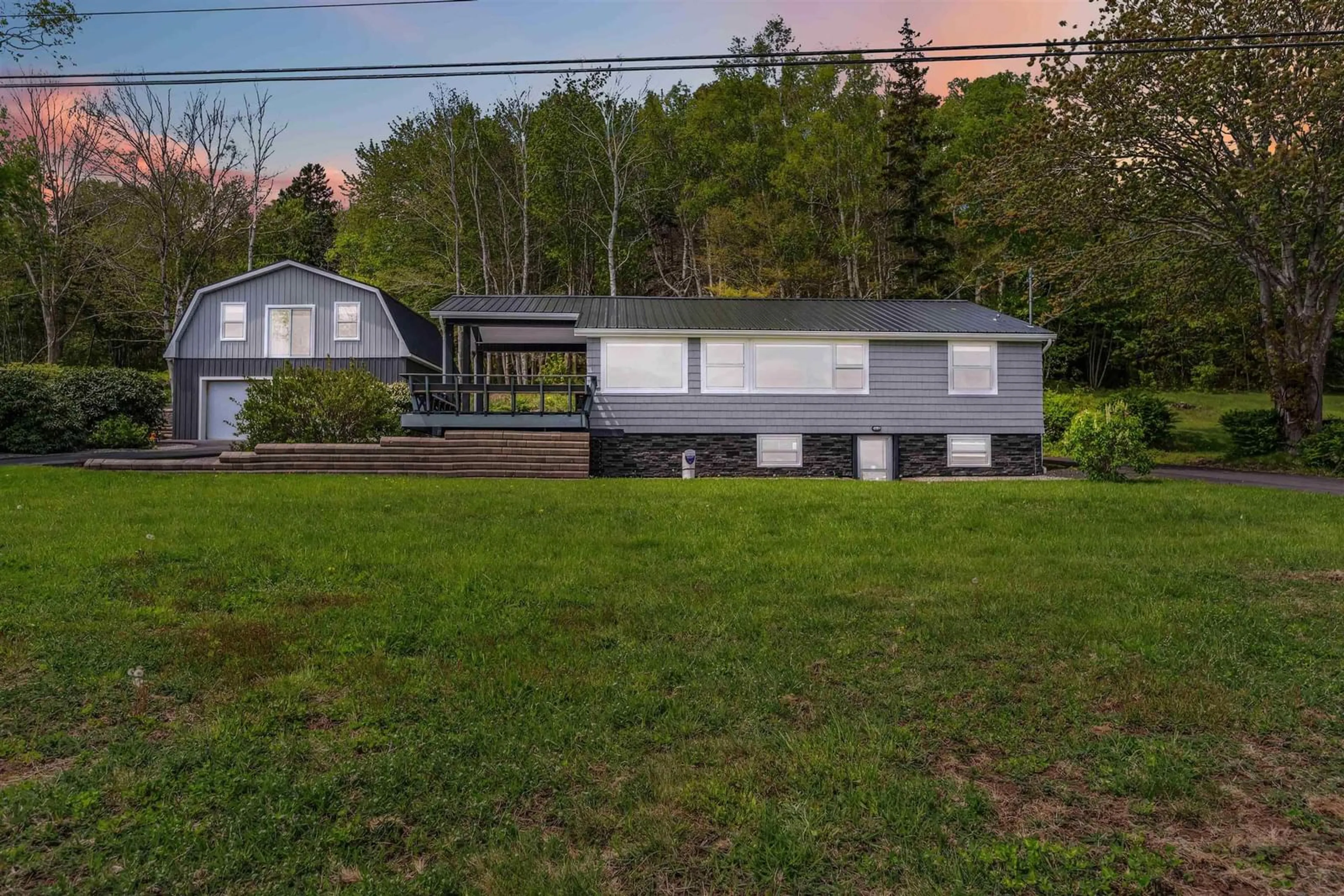 A pic from outside/outdoor area/front of a property/back of a property/a pic from drone, unknown for 377 Shore Rd, Bay View Nova Scotia B0V 1A0