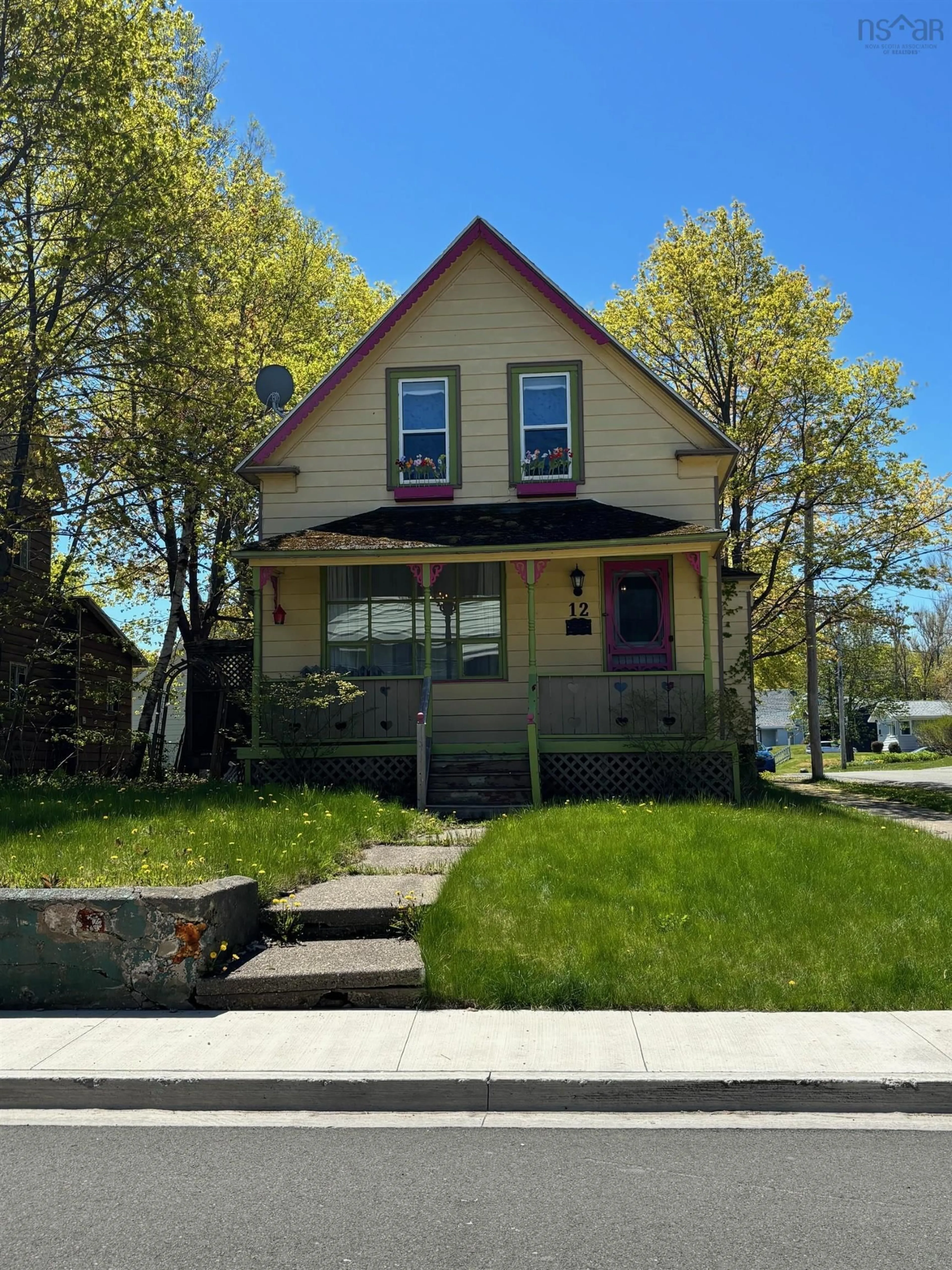 Home with vinyl exterior material, street for 12 Beech St, North Sydney Nova Scotia B2A 1H3