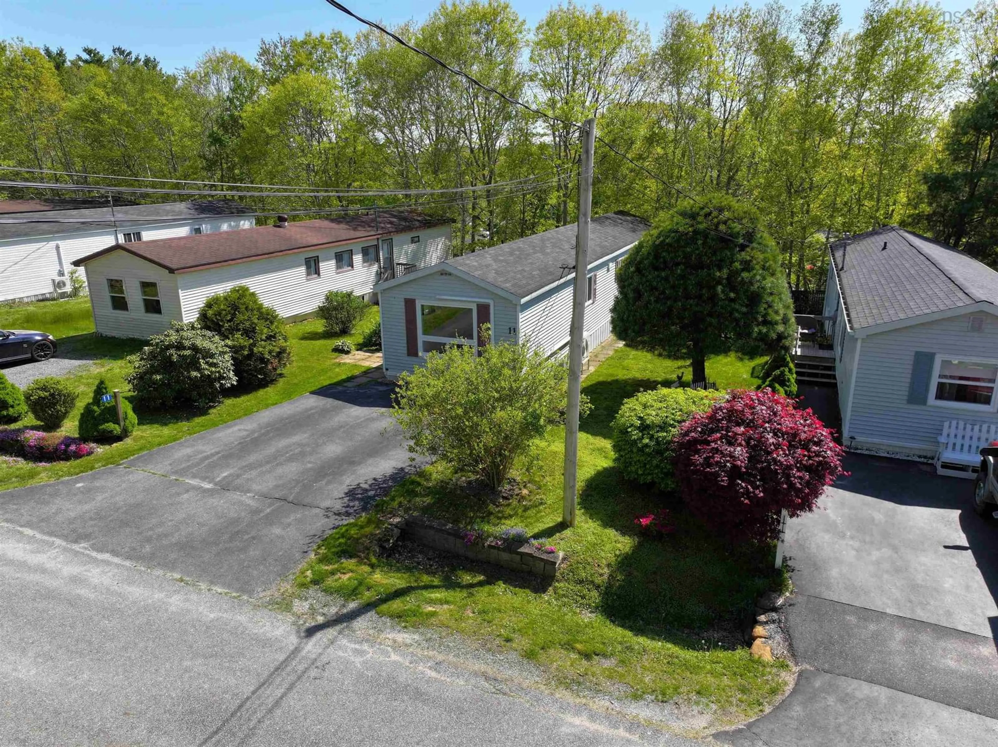 A pic from outside/outdoor area/front of a property/back of a property/a pic from drone, street for 11 Autumn St, Bridgewater Nova Scotia B4V 3S8