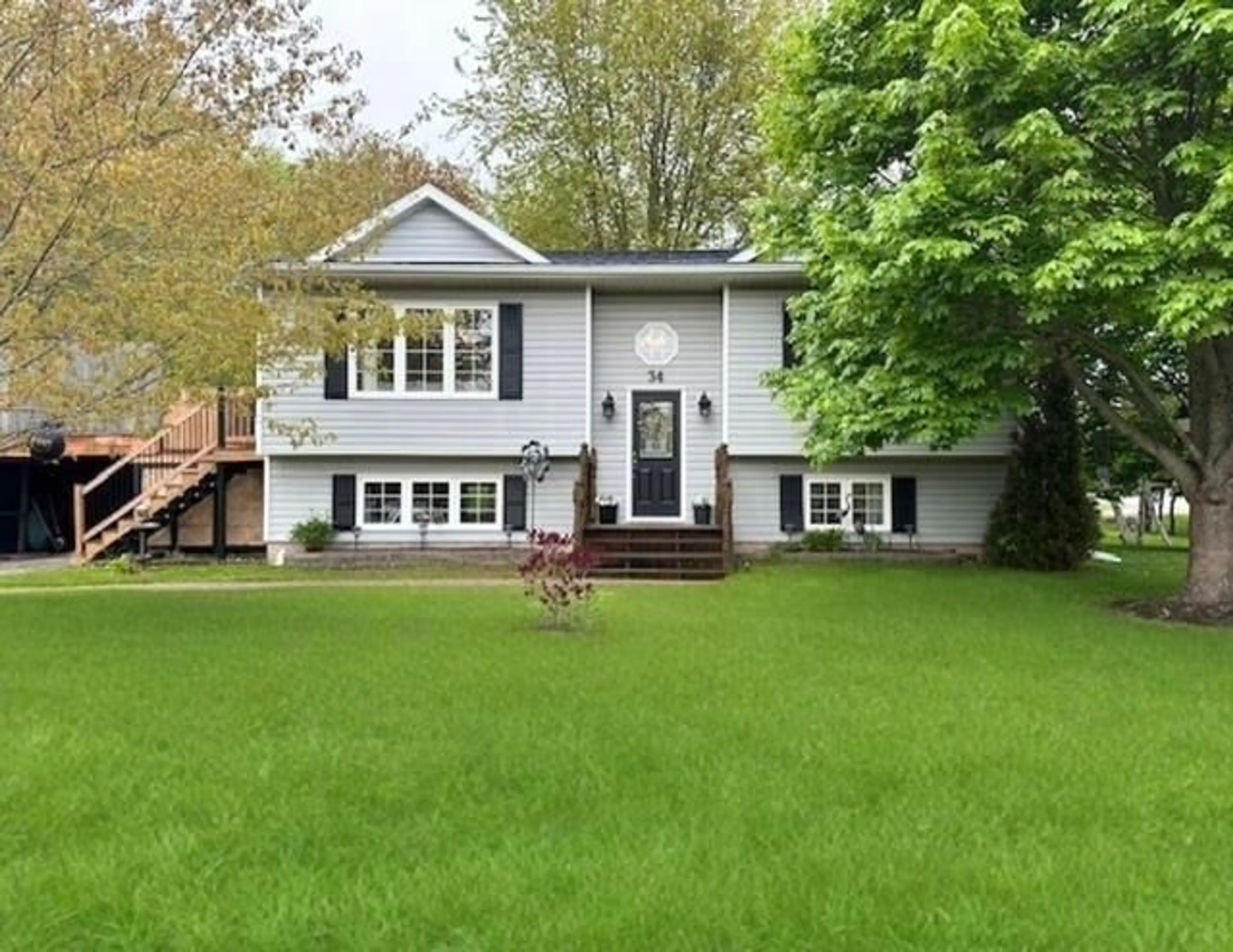 Home with vinyl exterior material, street for 34 Maplewood Lane, Kingston Nova Scotia B0P 1R0