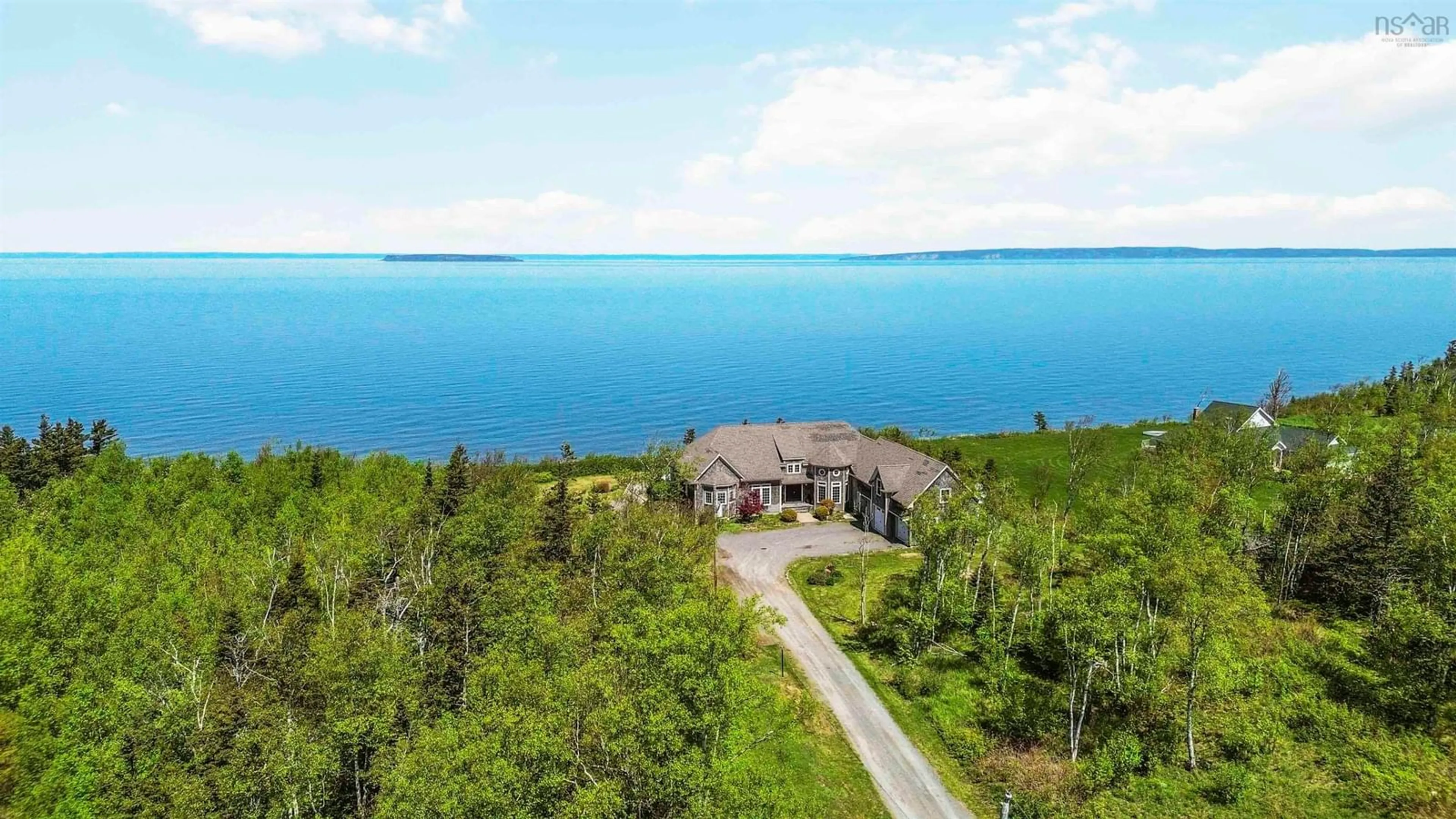A pic from outside/outdoor area/front of a property/back of a property/a pic from drone, water/lake/river/ocean view for 70 Fundy Bay Dr, Victoria Harbour Nova Scotia B0P 1C0