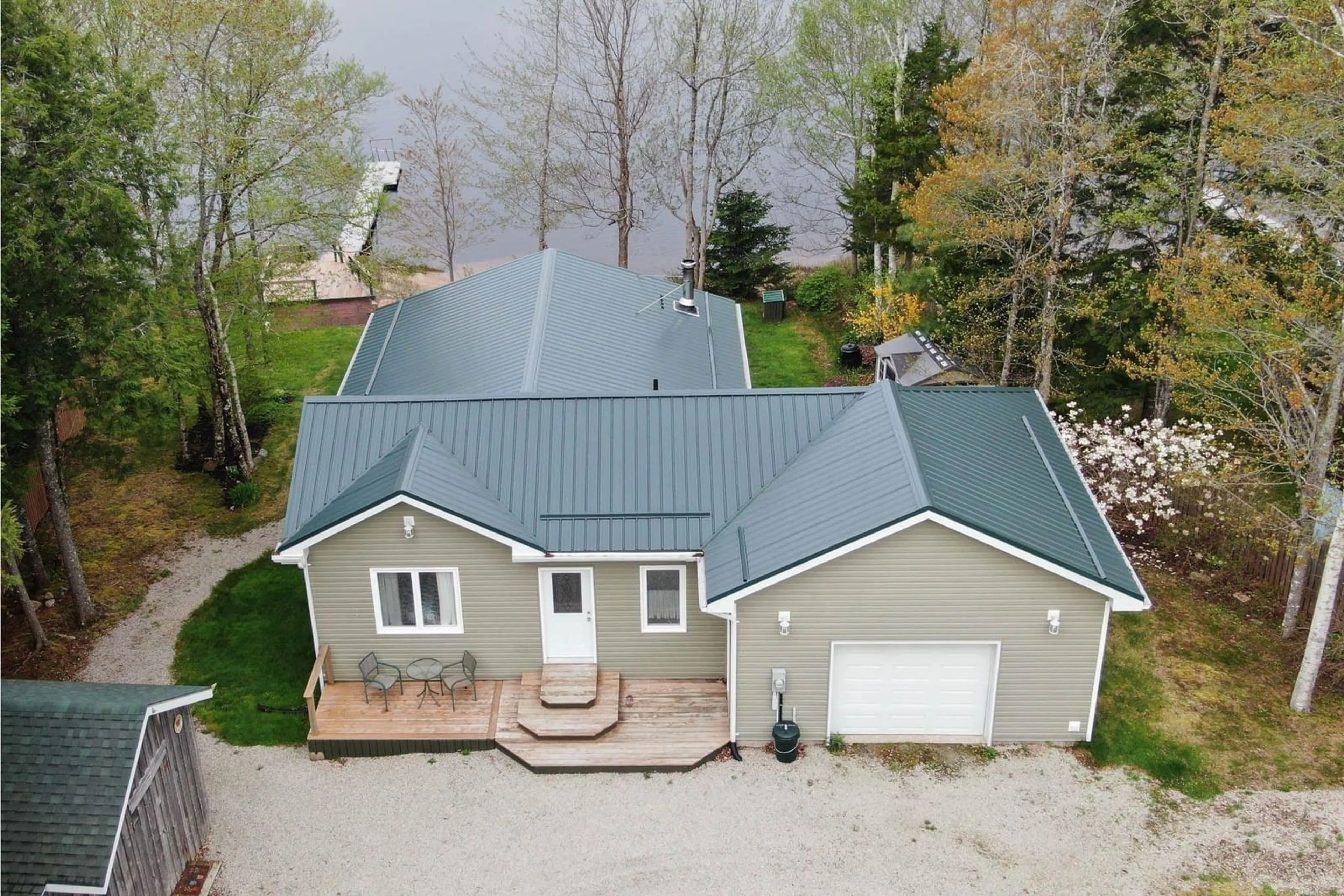 A pic from outside/outdoor area/front of a property/back of a property/a pic from drone, water/lake/river/ocean view for 377 Wallaback Dr, New Ross Nova Scotia B0J 2M0
