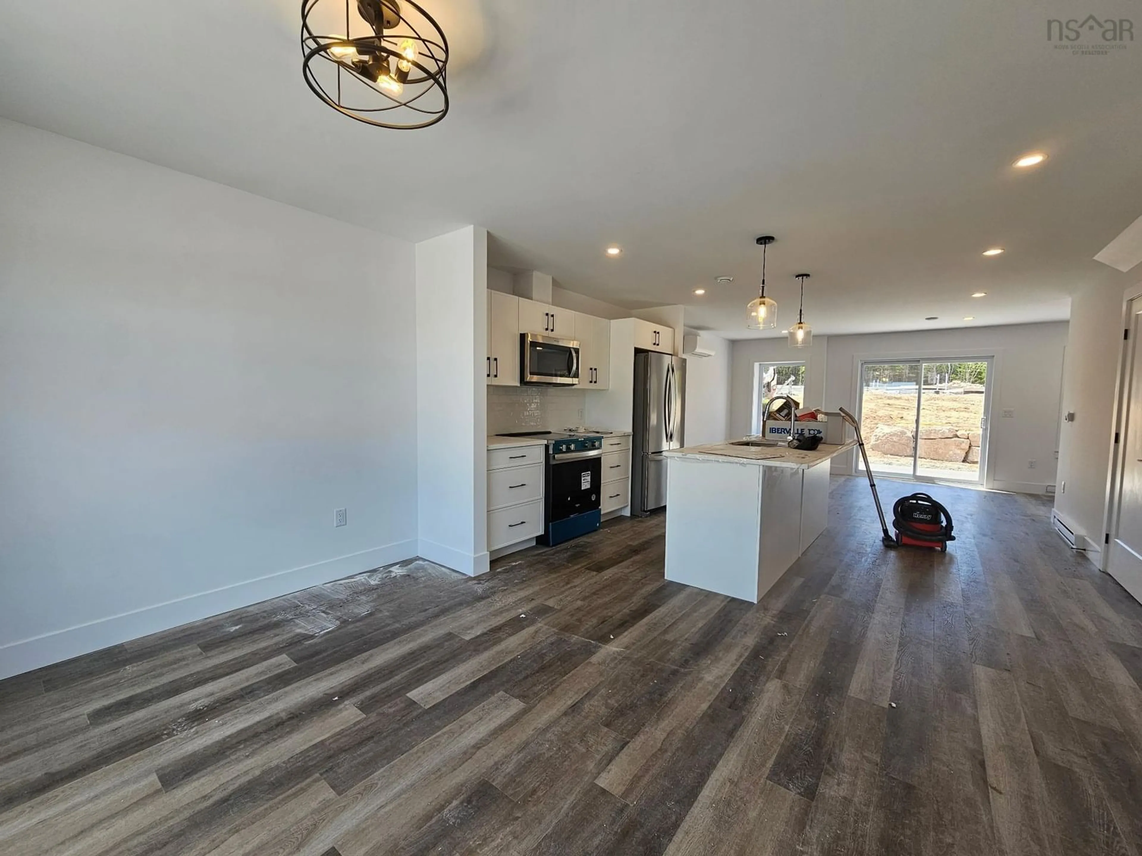 Open concept kitchen, wood/laminate floor for 196 Provence Way, Timberlea Nova Scotia B3T 0N8