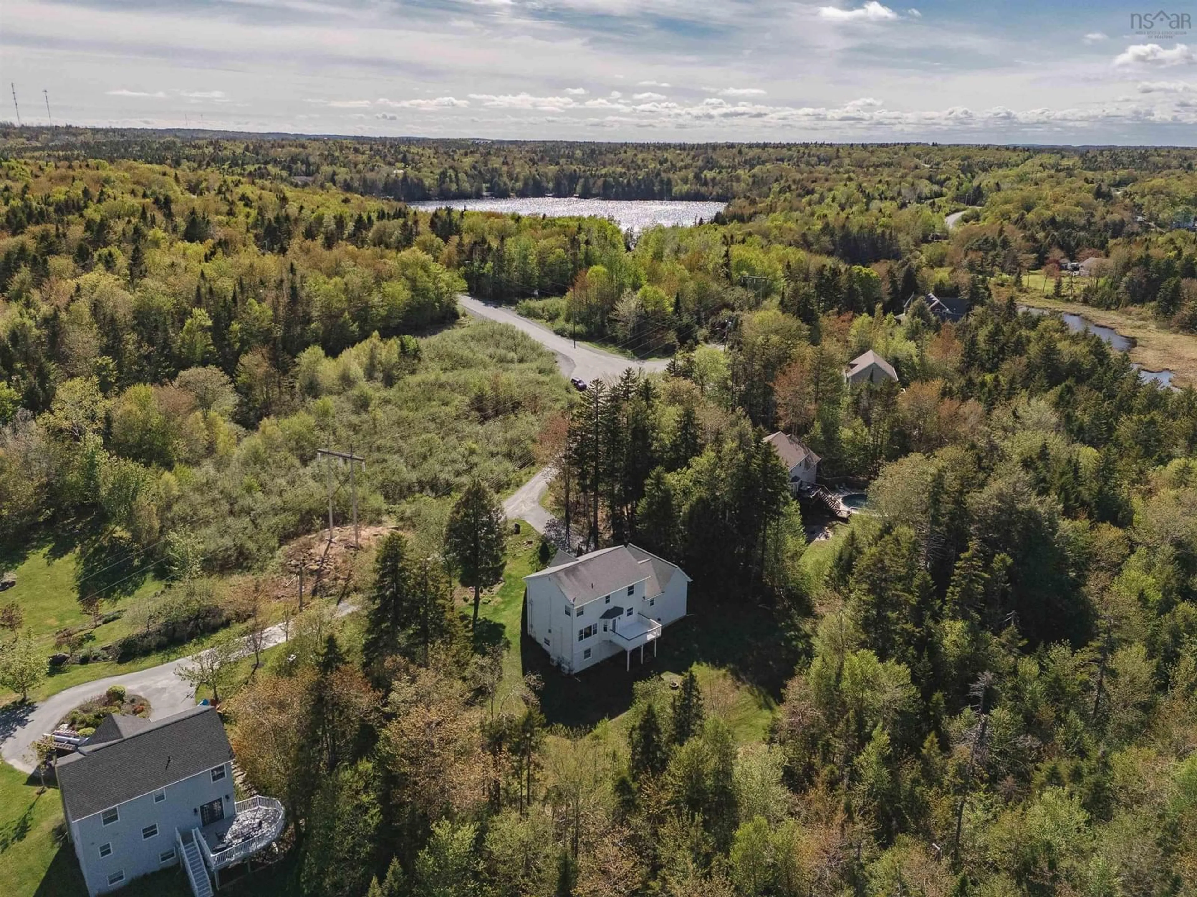 A pic from outside/outdoor area/front of a property/back of a property/a pic from drone, water/lake/river/ocean view for 22 Chase Lane, Hammonds Plains Nova Scotia B4B 1M9