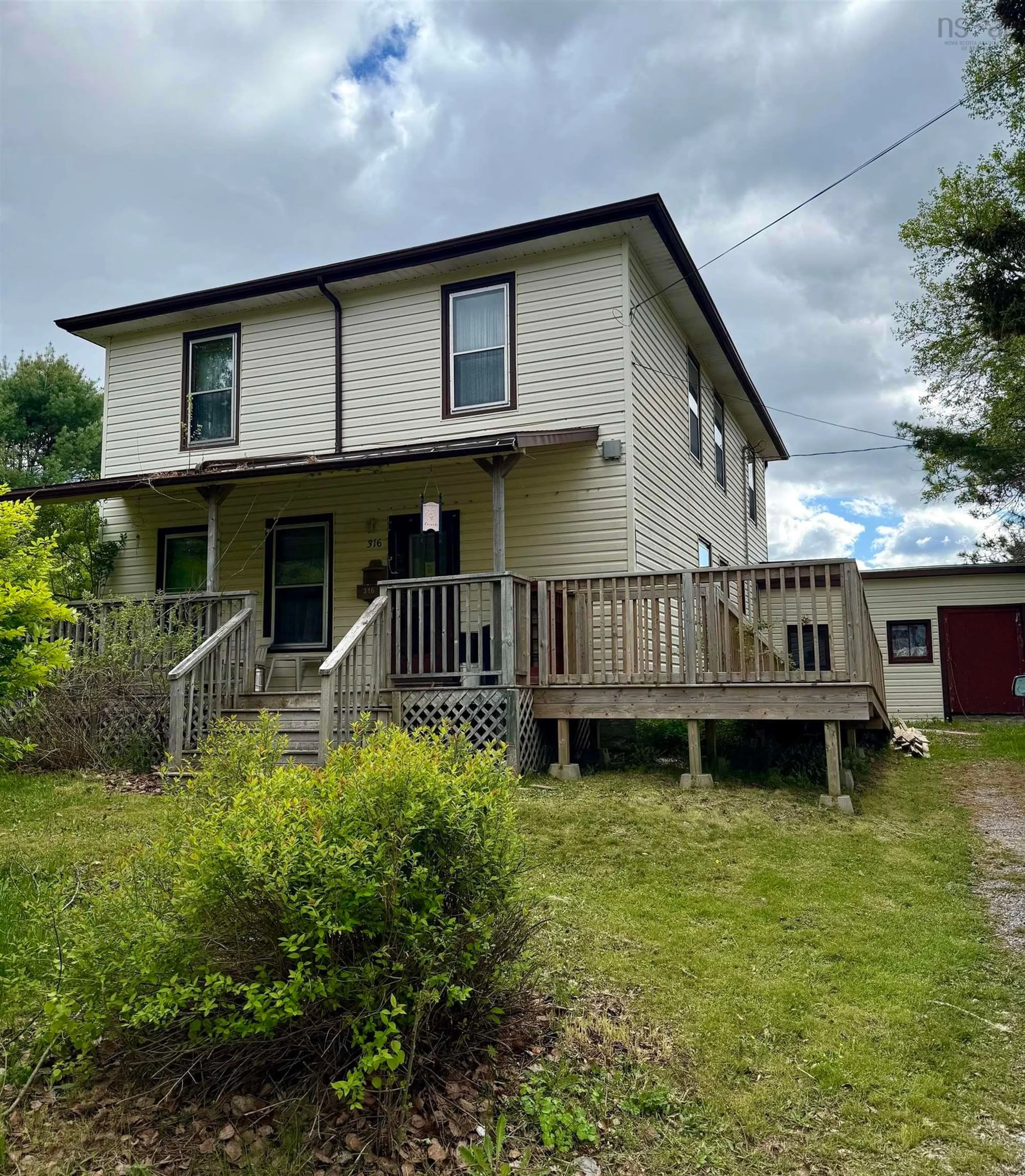 A pic from outside/outdoor area/front of a property/back of a property/a pic from drone, building for 316 Highway 3, Sable River Nova Scotia B0T 1V0