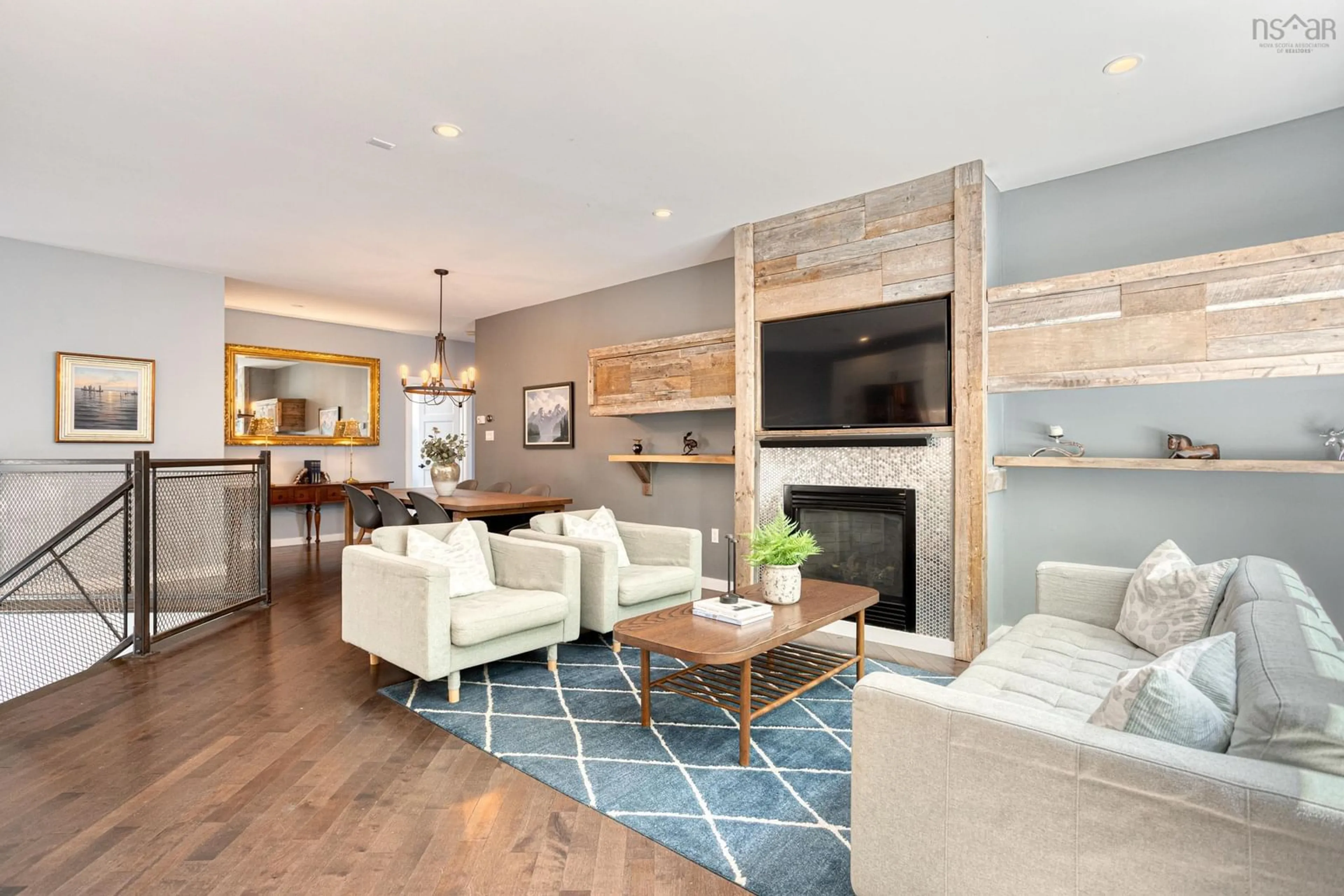 Living room with furniture, wood/laminate floor for 646 St. Margarets Bay Rd, Halifax Nova Scotia B3N 1K7