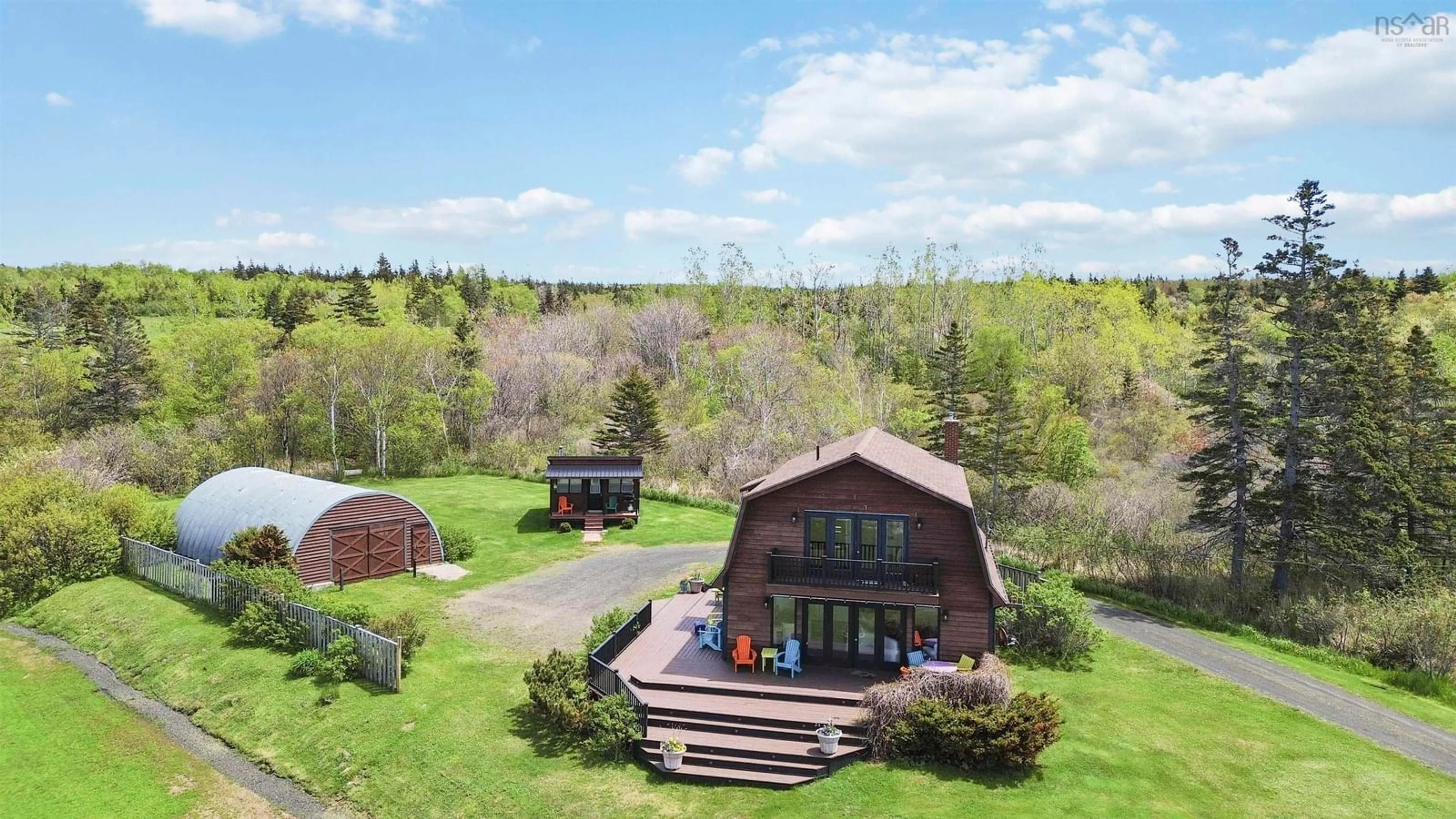 A pic from outside/outdoor area/front of a property/back of a property/a pic from drone, unknown for 11866 Shore Rd, Cottage Cove Nova Scotia B0S 1P0