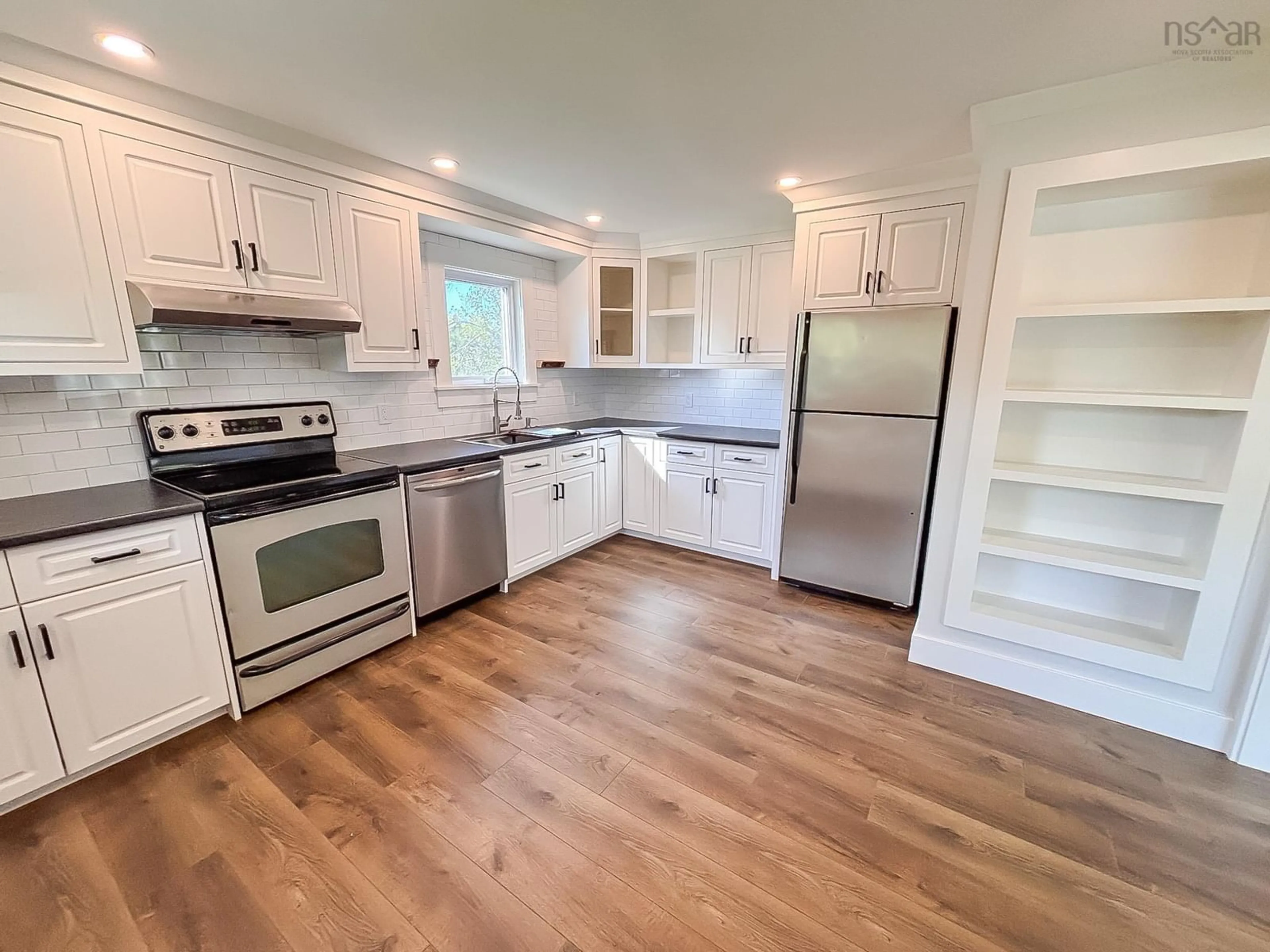 Open concept kitchen, wood/laminate floor for 67 Hirtle Rd, Maitland Nova Scotia B4V 6M2