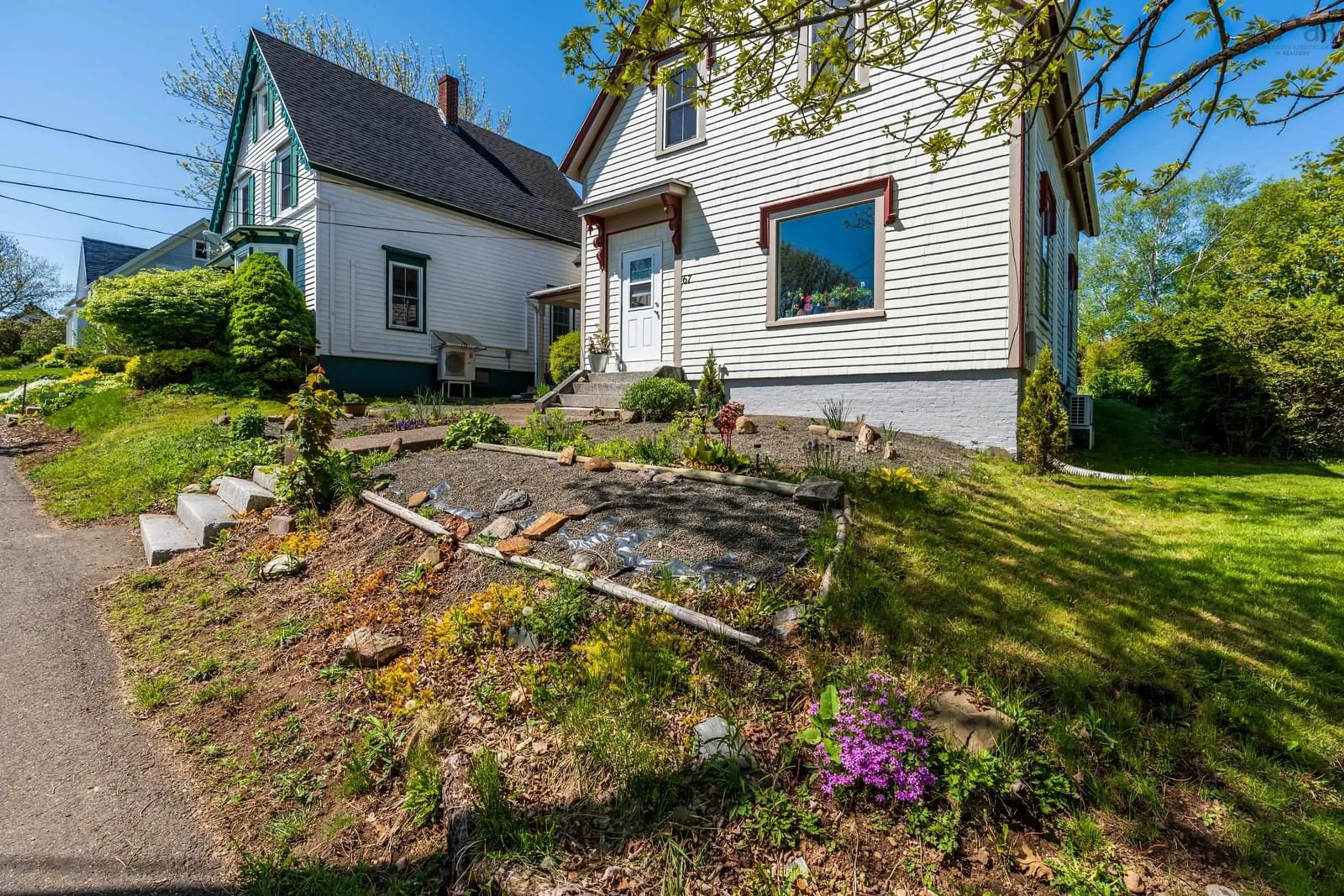 A pic from outside/outdoor area/front of a property/back of a property/a pic from drone, street for 65/67 Montague Row, Digby Nova Scotia B0V 1A0
