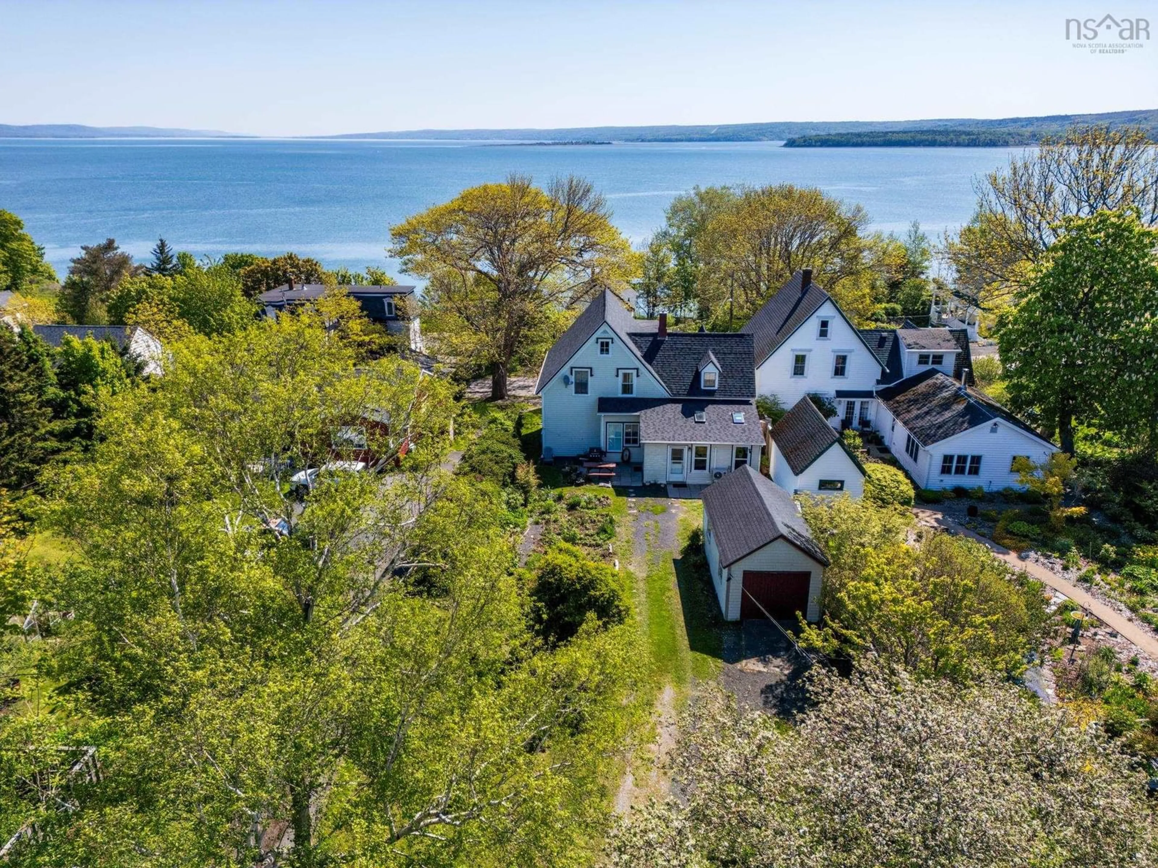 A pic from outside/outdoor area/front of a property/back of a property/a pic from drone, water/lake/river/ocean view for 65/67 Montague Row, Digby Nova Scotia B0V 1A0