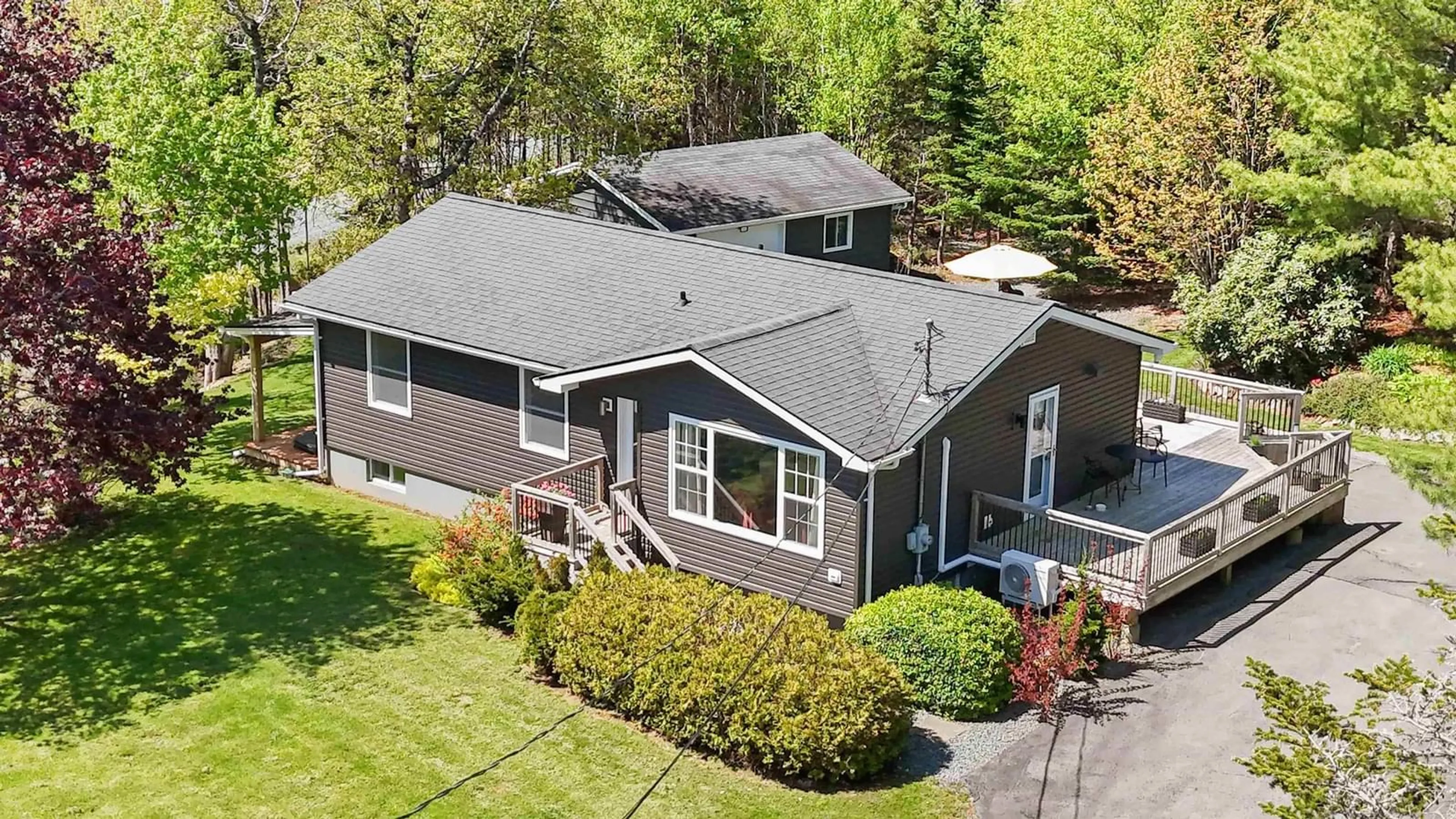 A pic from outside/outdoor area/front of a property/back of a property/a pic from drone, street for 445 West Porters Lake Rd, West Porters Lake Nova Scotia B3E 1K5