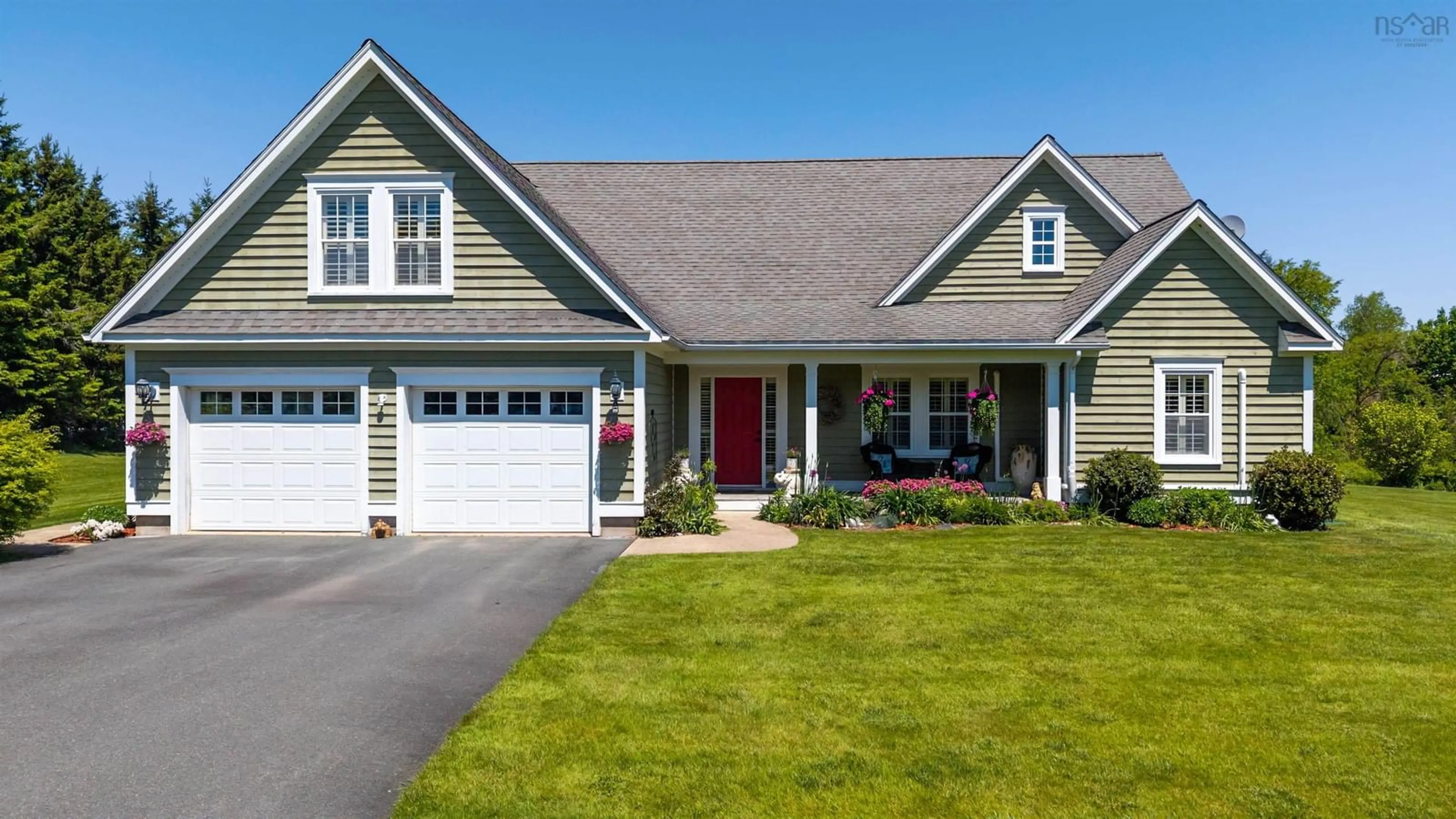 Home with vinyl exterior material, street for 949 Centennial Dr, Port Williams Nova Scotia B0P 1T0