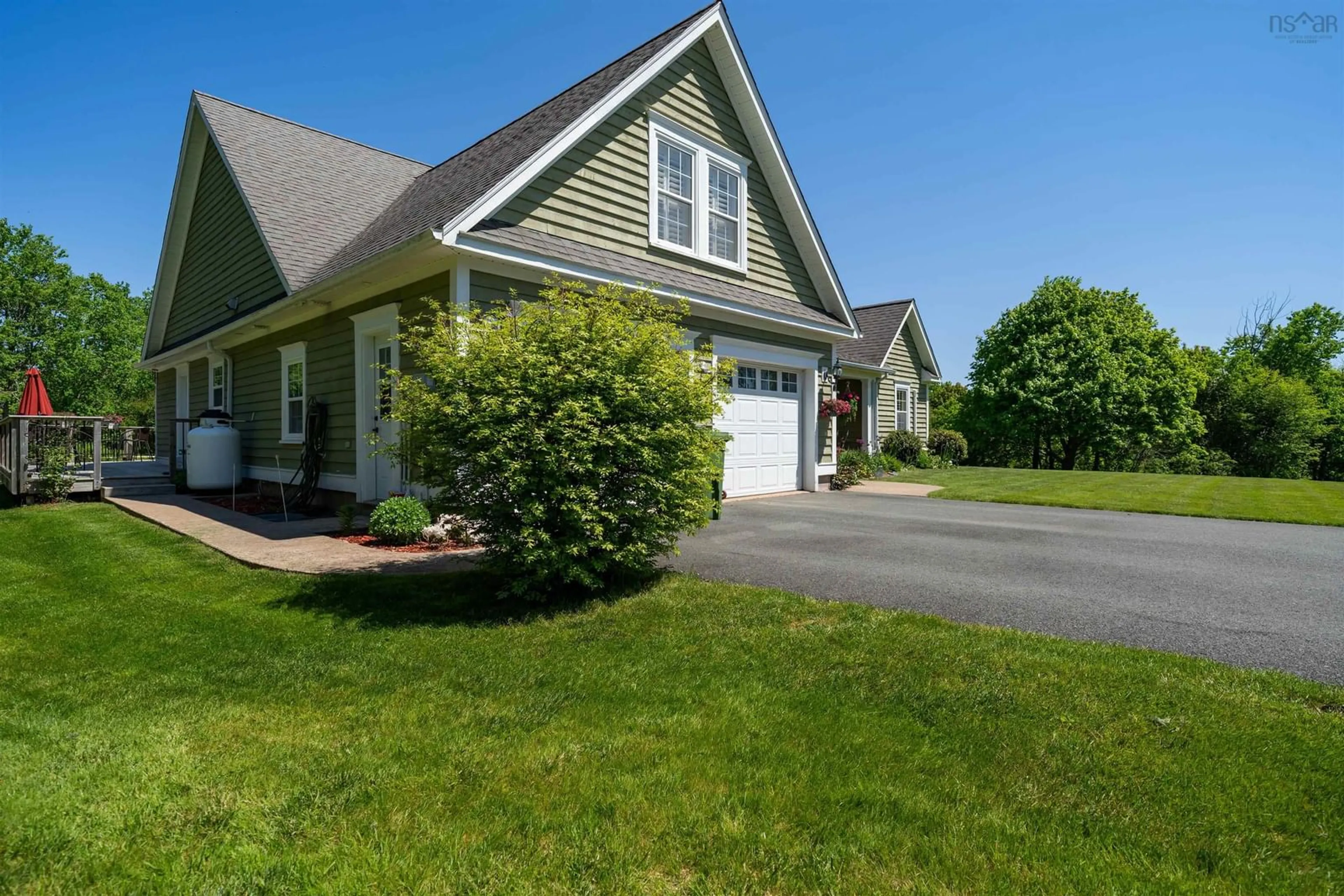 Home with vinyl exterior material, street for 949 Centennial Dr, Port Williams Nova Scotia B0P 1T0