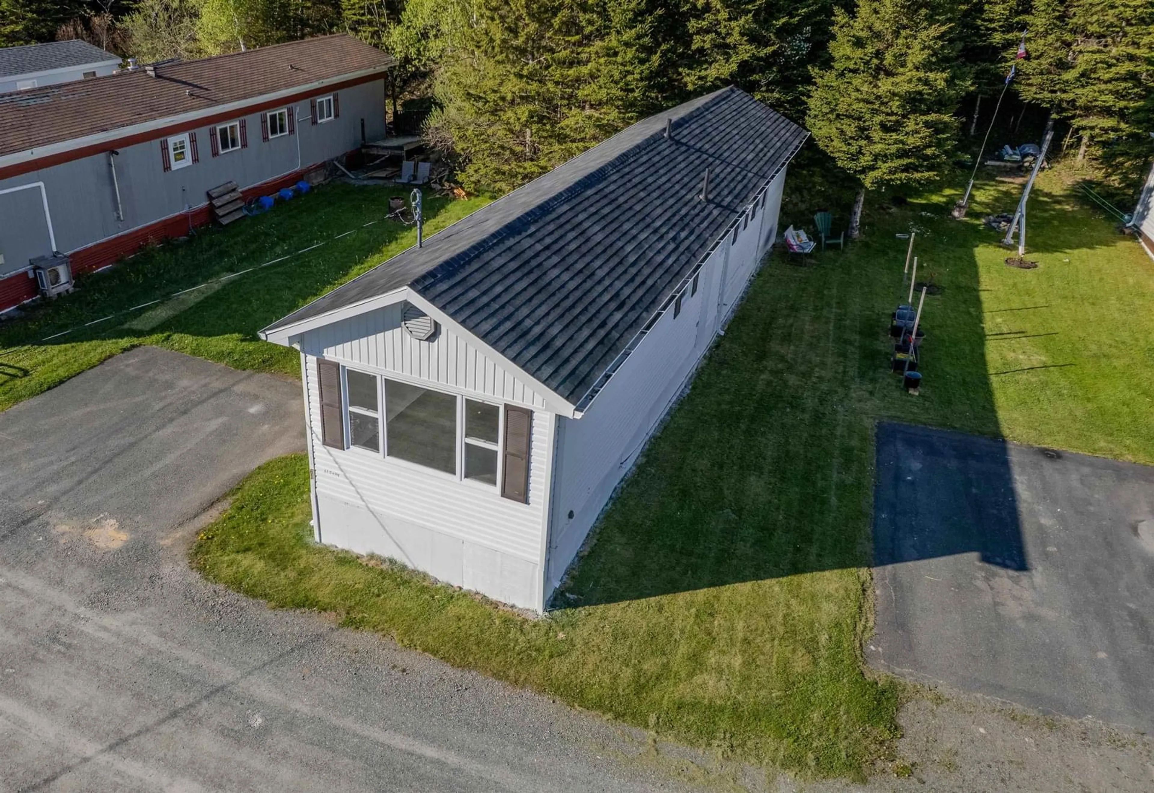 A pic from outside/outdoor area/front of a property/back of a property/a pic from drone, street for 61 Curry, Howie Centre Nova Scotia B1L 1G3