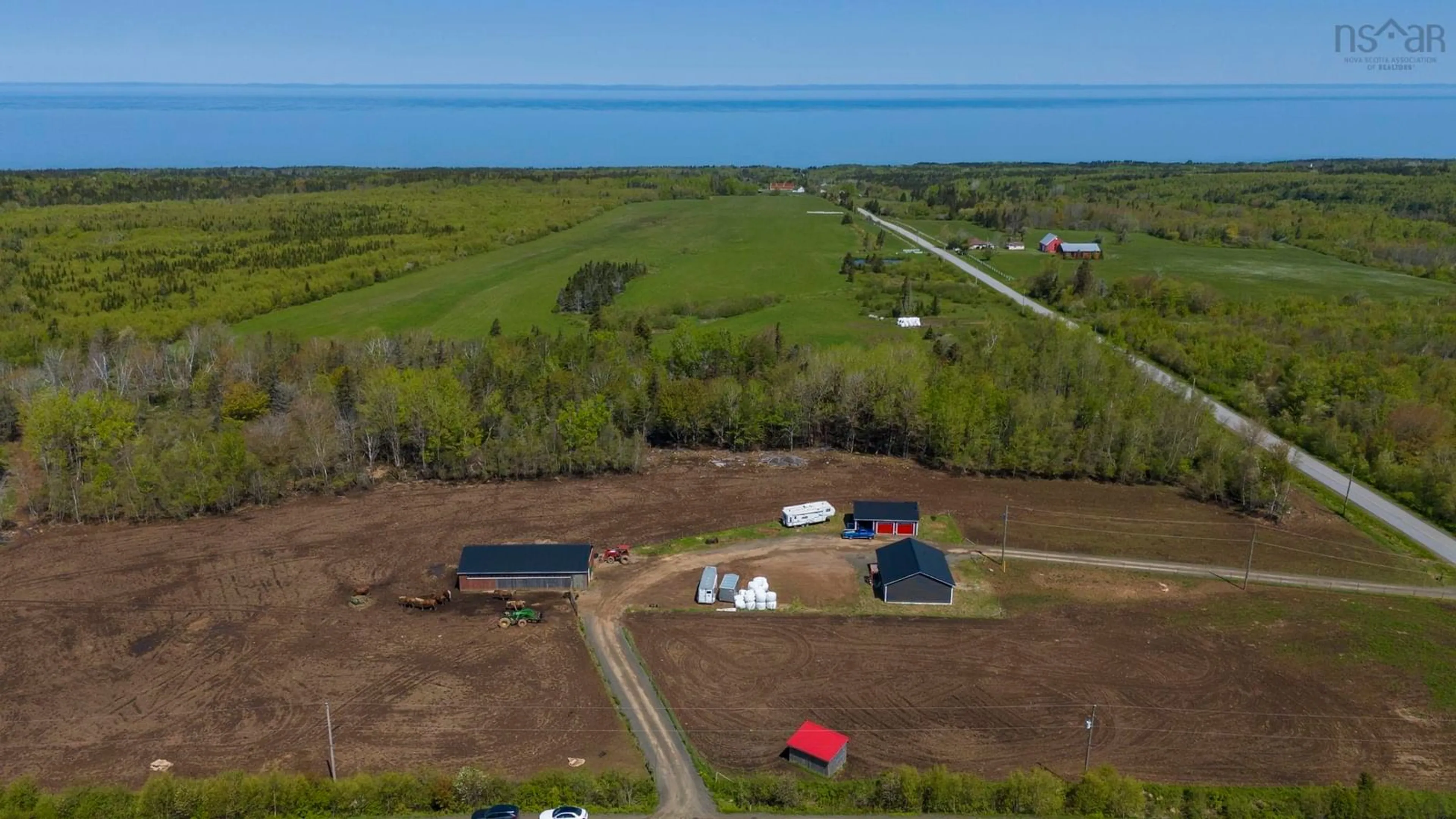 A pic from outside/outdoor area/front of a property/back of a property/a pic from drone, water/lake/river/ocean view for 21 Brinton Rd, Mount Rose Nova Scotia B0S 1C0