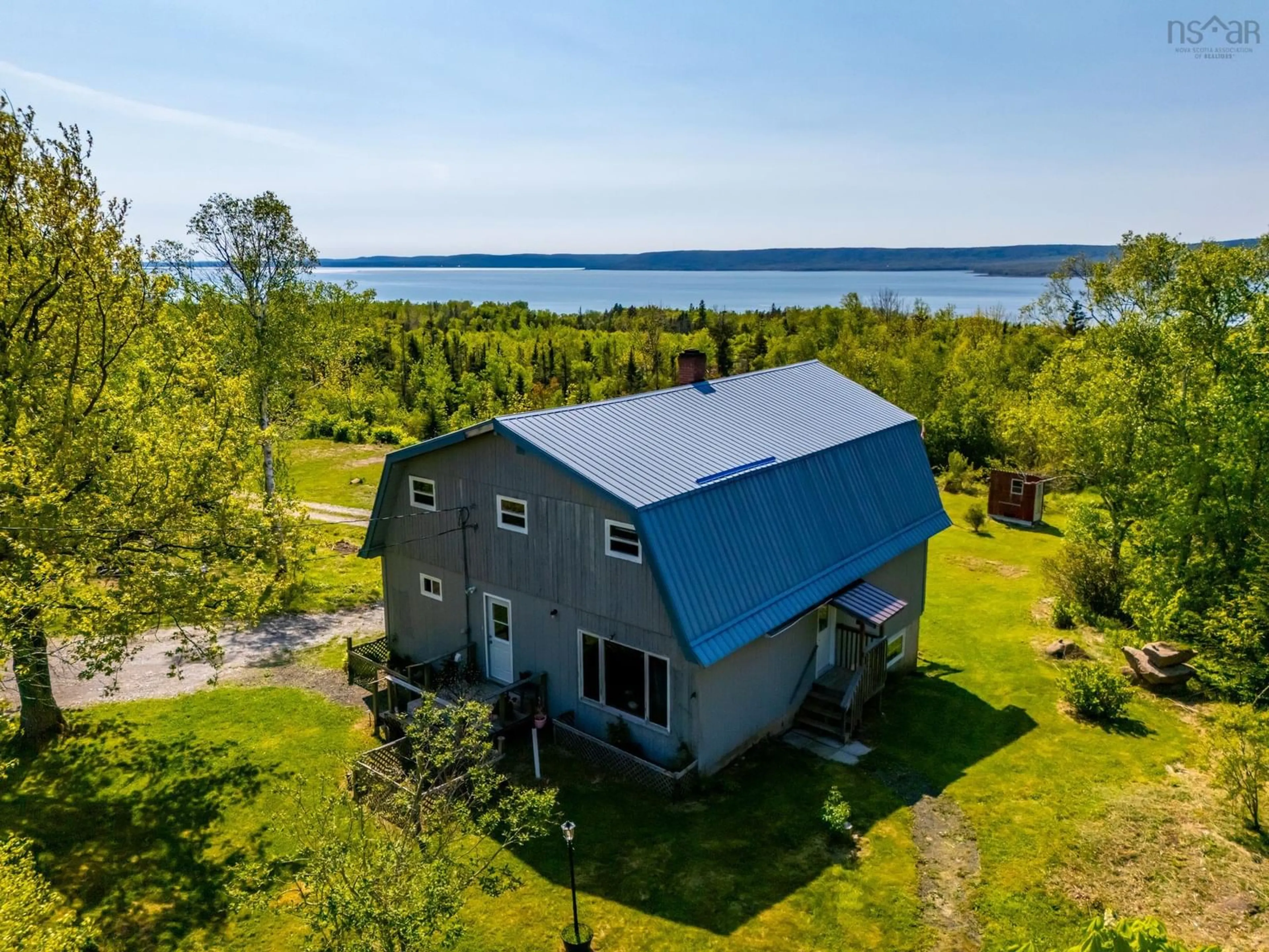 A pic from outside/outdoor area/front of a property/back of a property/a pic from drone, water/lake/river/ocean view for 115 Pickup Rd, Clementsport Nova Scotia B0S 1A0