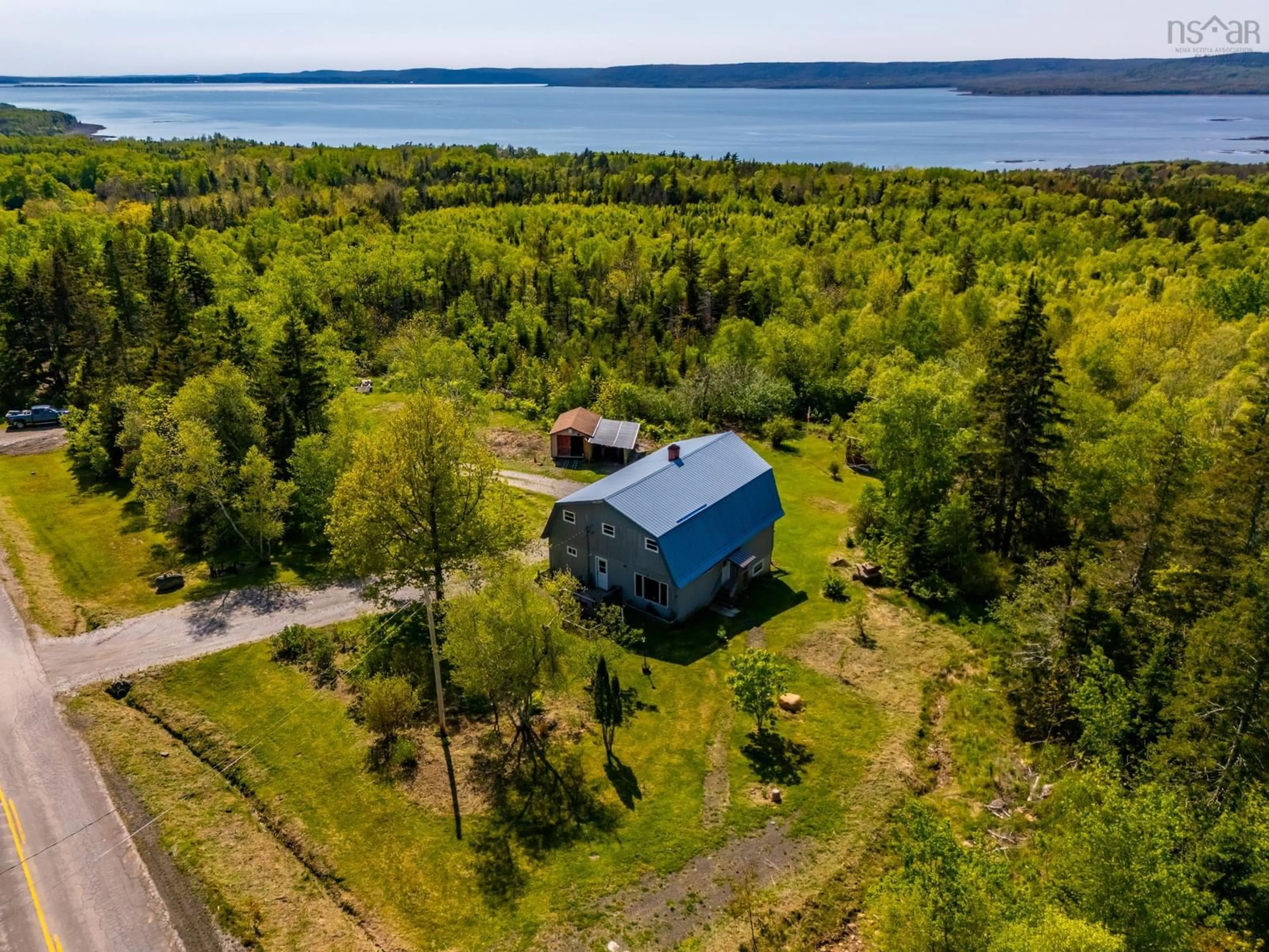 A pic from outside/outdoor area/front of a property/back of a property/a pic from drone, water/lake/river/ocean view for 115 Pickup Rd, Clementsport Nova Scotia B0S 1A0