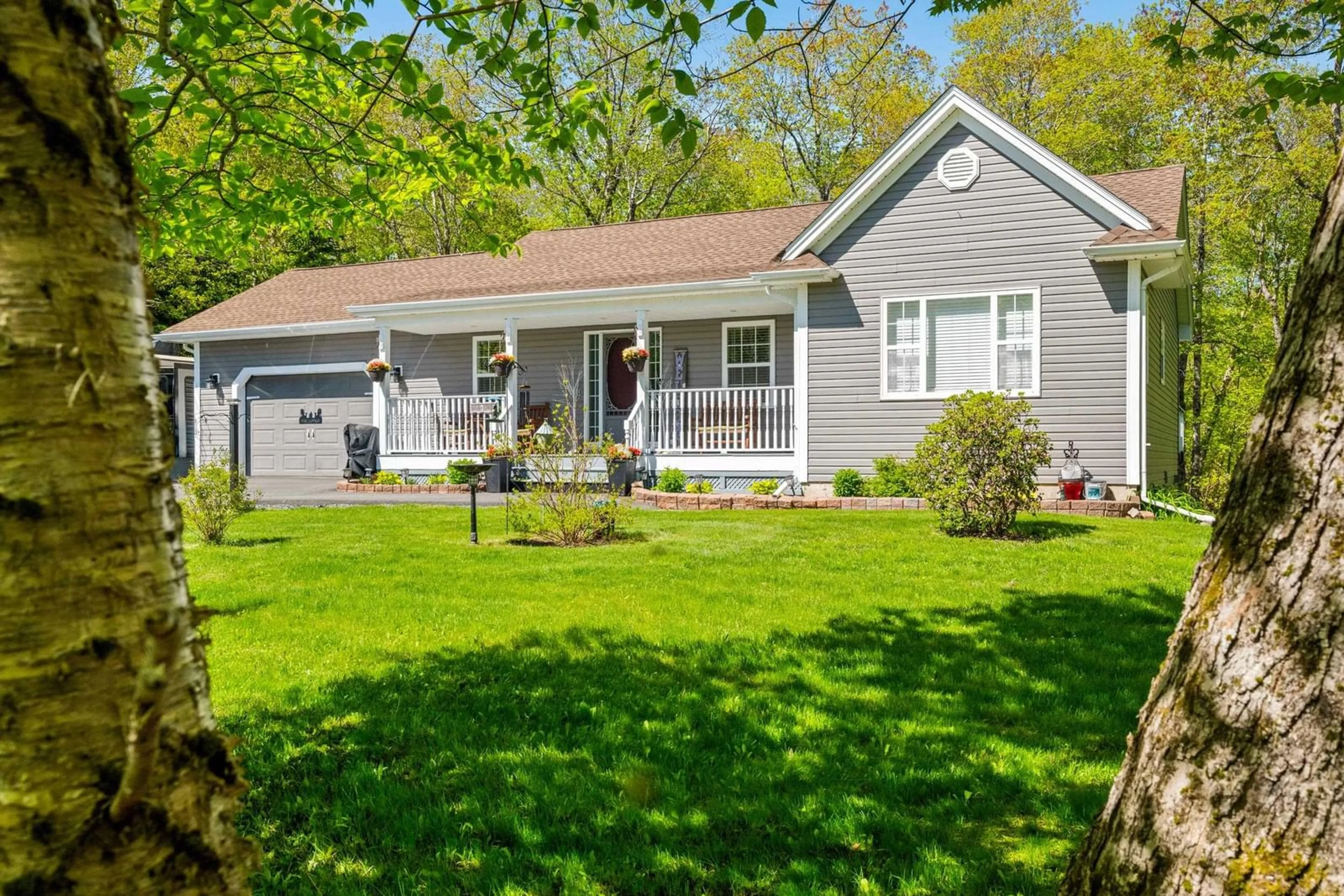 Home with vinyl exterior material, street for 57 Lodge Ave, Hammonds Plains Nova Scotia B4B 1W2