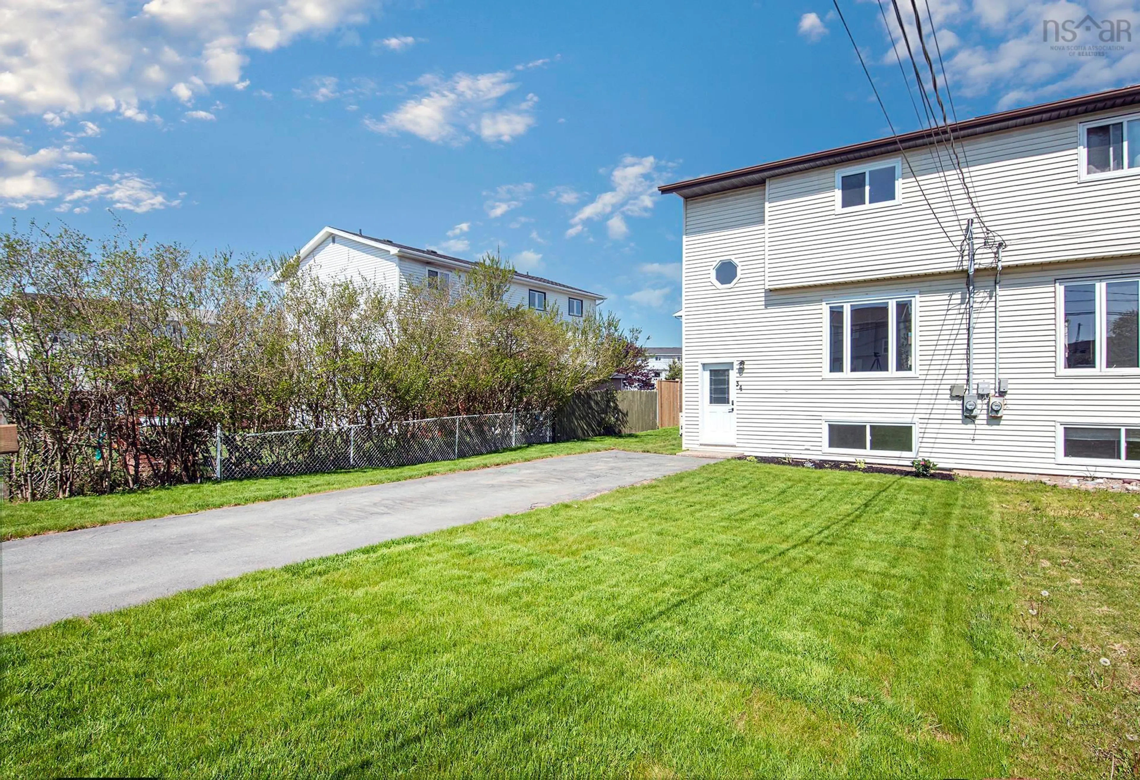 A pic from outside/outdoor area/front of a property/back of a property/a pic from drone, street for 34 Garrison Dr, Eastern Passage Nova Scotia B3G 1E5