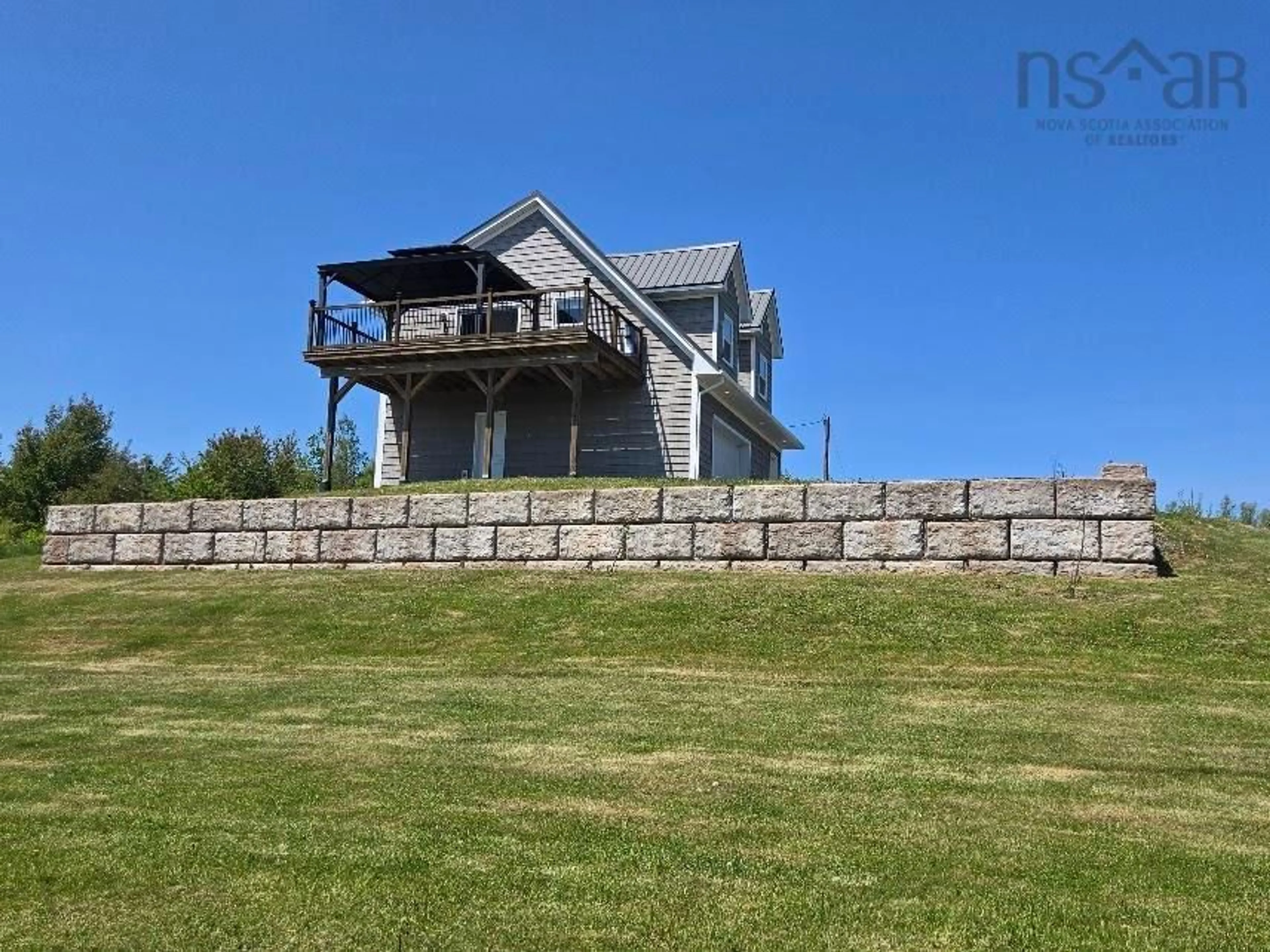 A pic from outside/outdoor area/front of a property/back of a property/a pic from drone, water/lake/river/ocean view for 98 King Lothar Dr, Barrachois Nova Scotia B0K 1V0