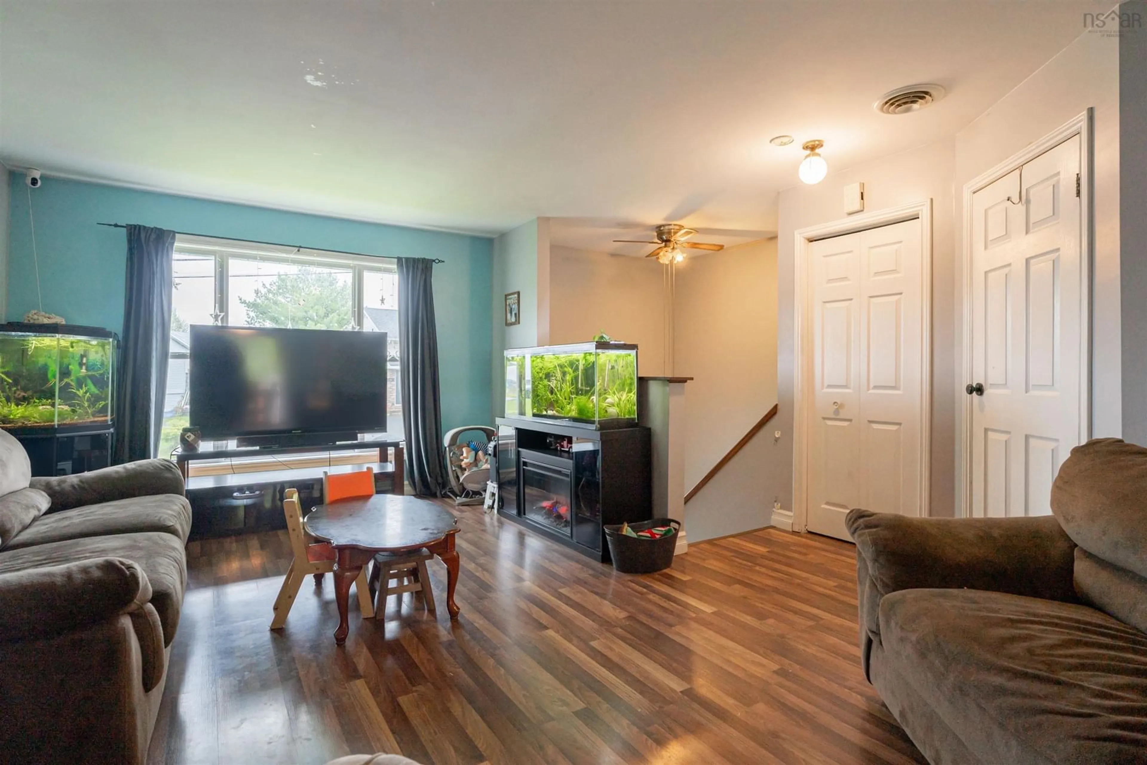 Living room with furniture, wood/laminate floor for 17 Contessa Crt, Lower Sackville Nova Scotia B4C 3W2