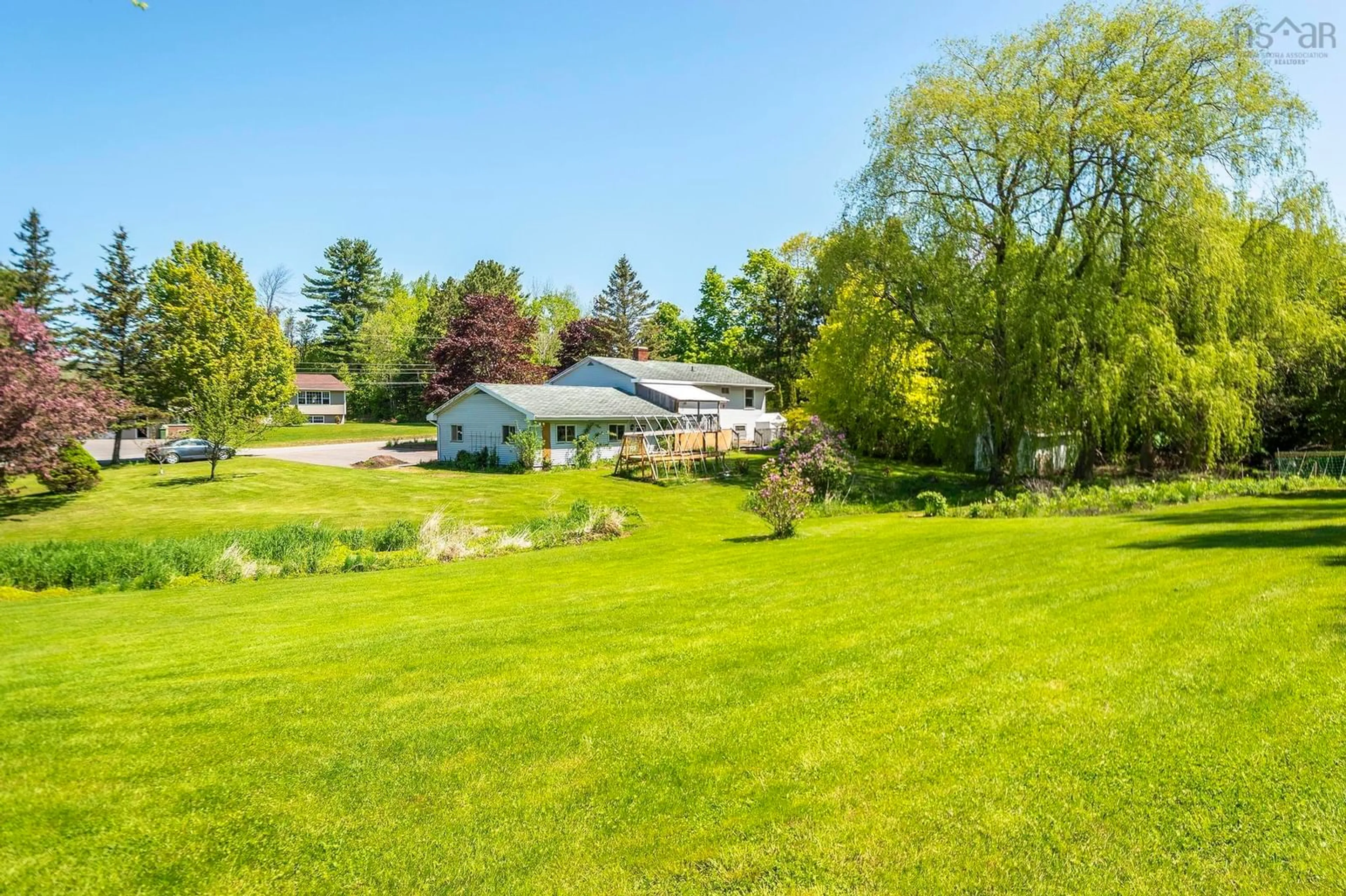 A pic from outside/outdoor area/front of a property/back of a property/a pic from drone, water/lake/river/ocean view for 8120 221 Hwy, Centreville Nova Scotia B0P 1J0