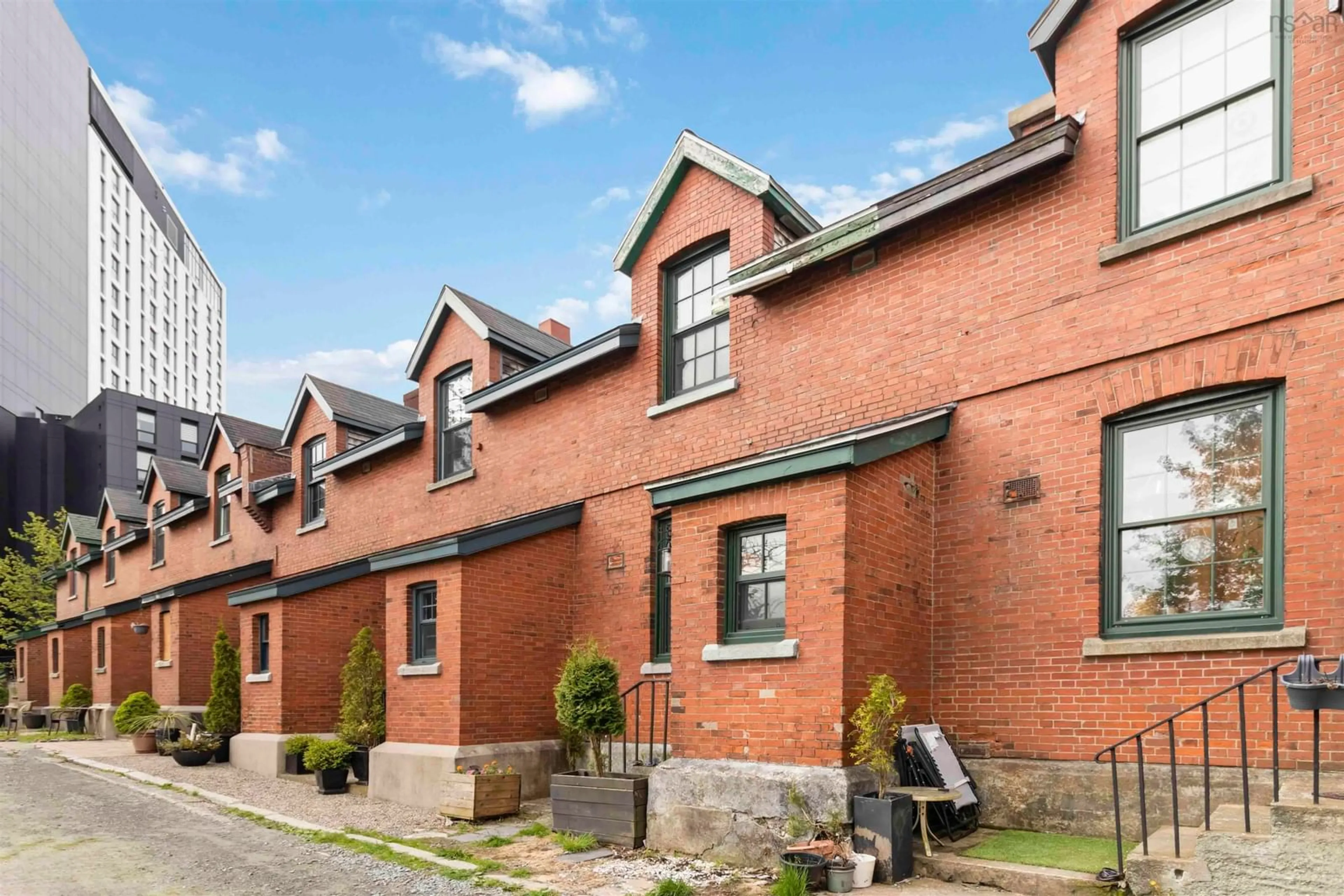 Home with brick exterior material, street for 2058 Brunswick St, Halifax Peninsula Nova Scotia B3K 2Y7