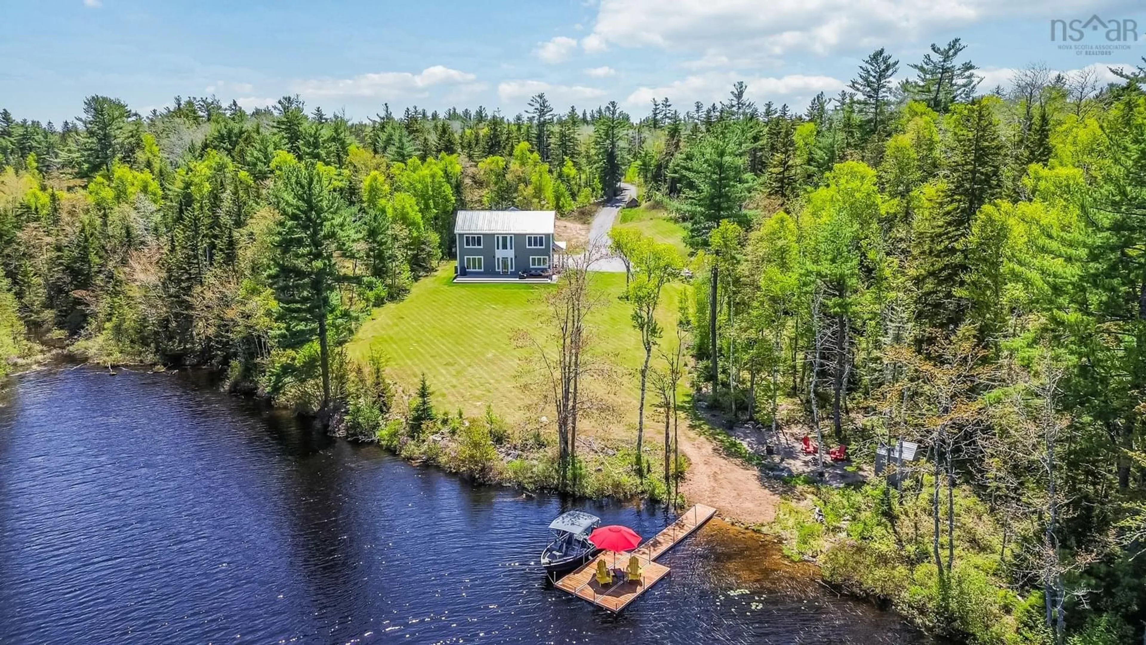 A pic from outside/outdoor area/front of a property/back of a property/a pic from drone, water/lake/river/ocean view for 672 Loon Lake Dr, Lake Paul Nova Scotia B0P 1C0