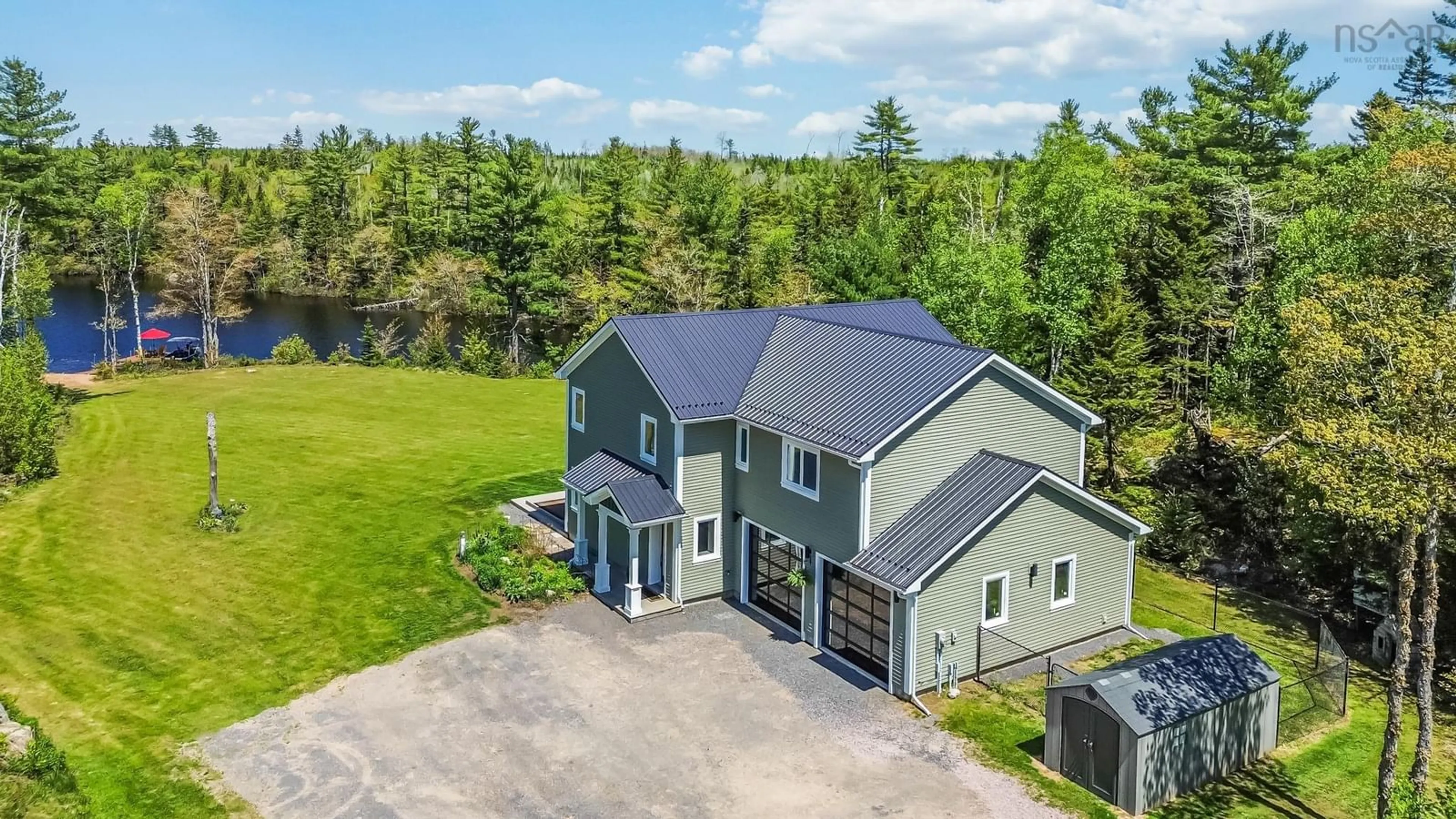 A pic from outside/outdoor area/front of a property/back of a property/a pic from drone, water/lake/river/ocean view for 672 Loon Lake Dr, Lake Paul Nova Scotia B0P 1C0