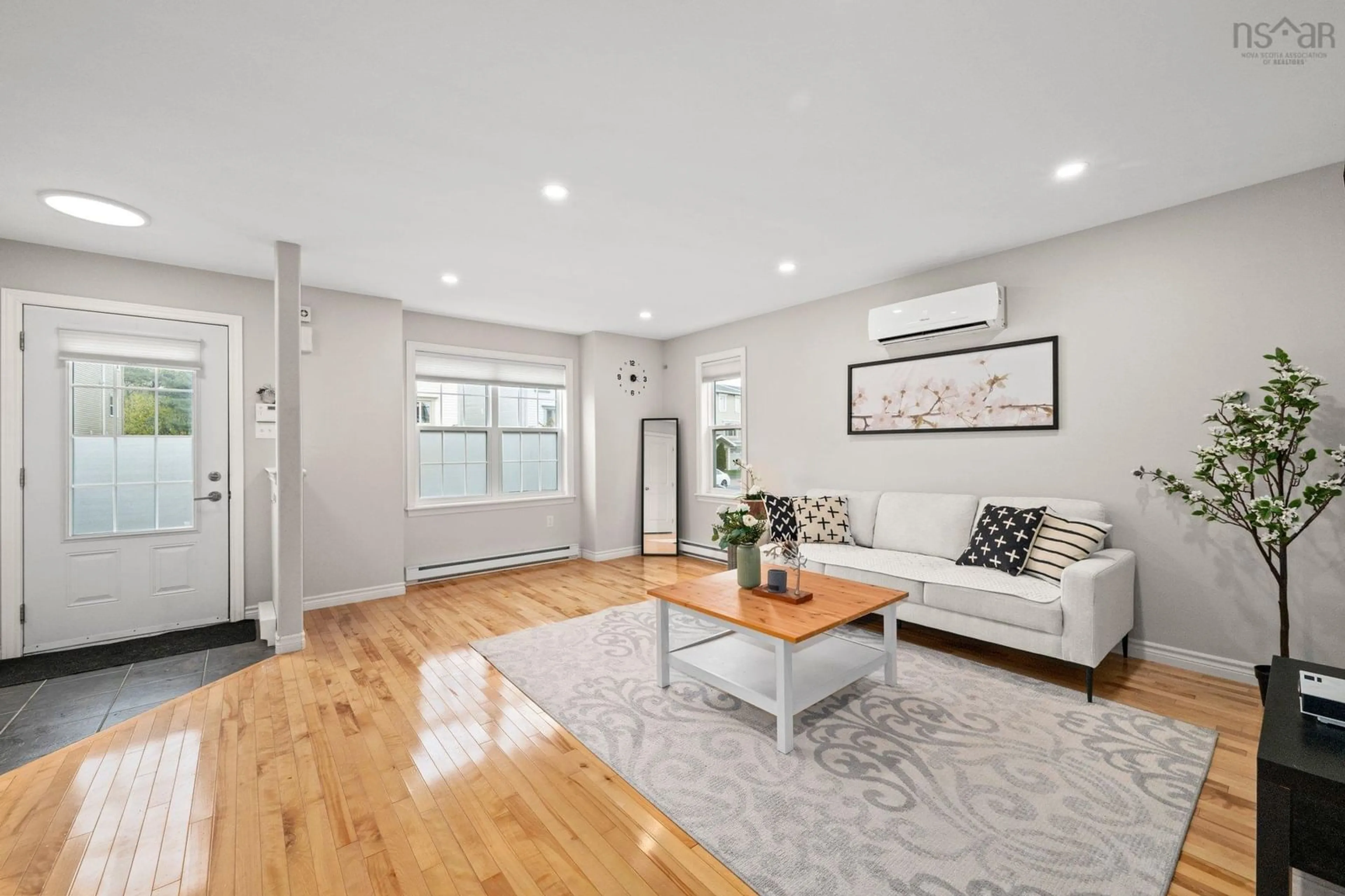 Living room with furniture, wood/laminate floor for 128 Transom Dr, Halifax Nova Scotia B3M 4T7