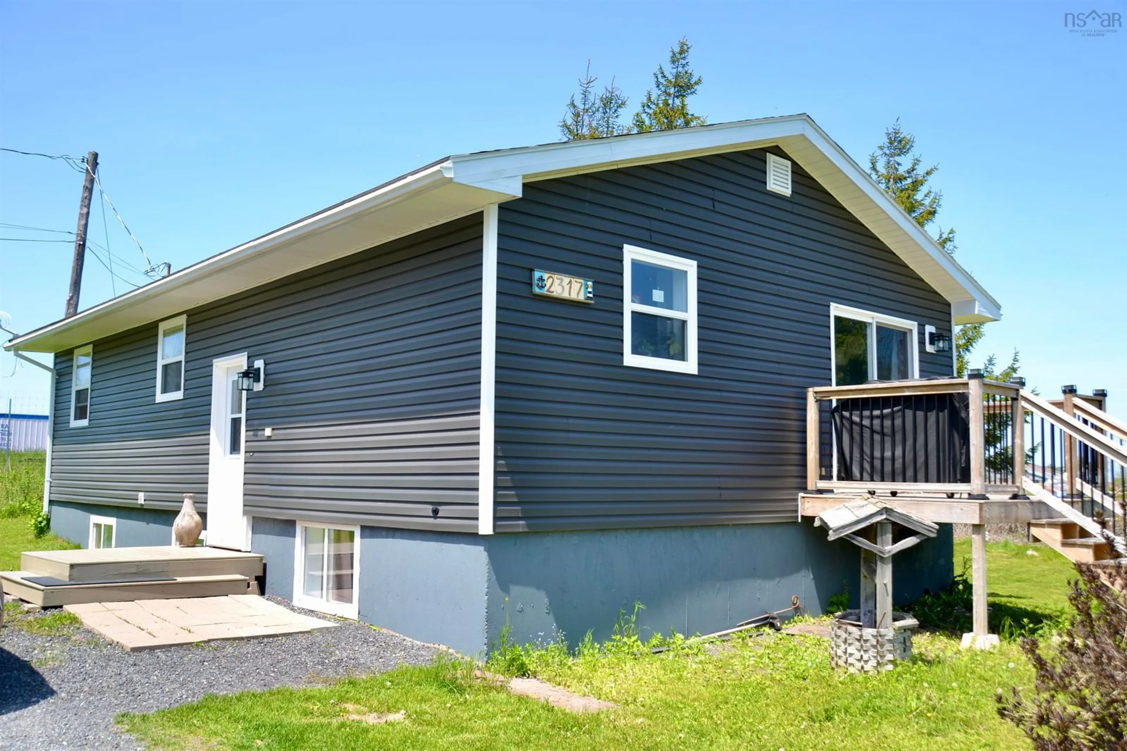 Home with vinyl exterior material, street for 2317 River Rd, Plymouth Nova Scotia B2H 5C5