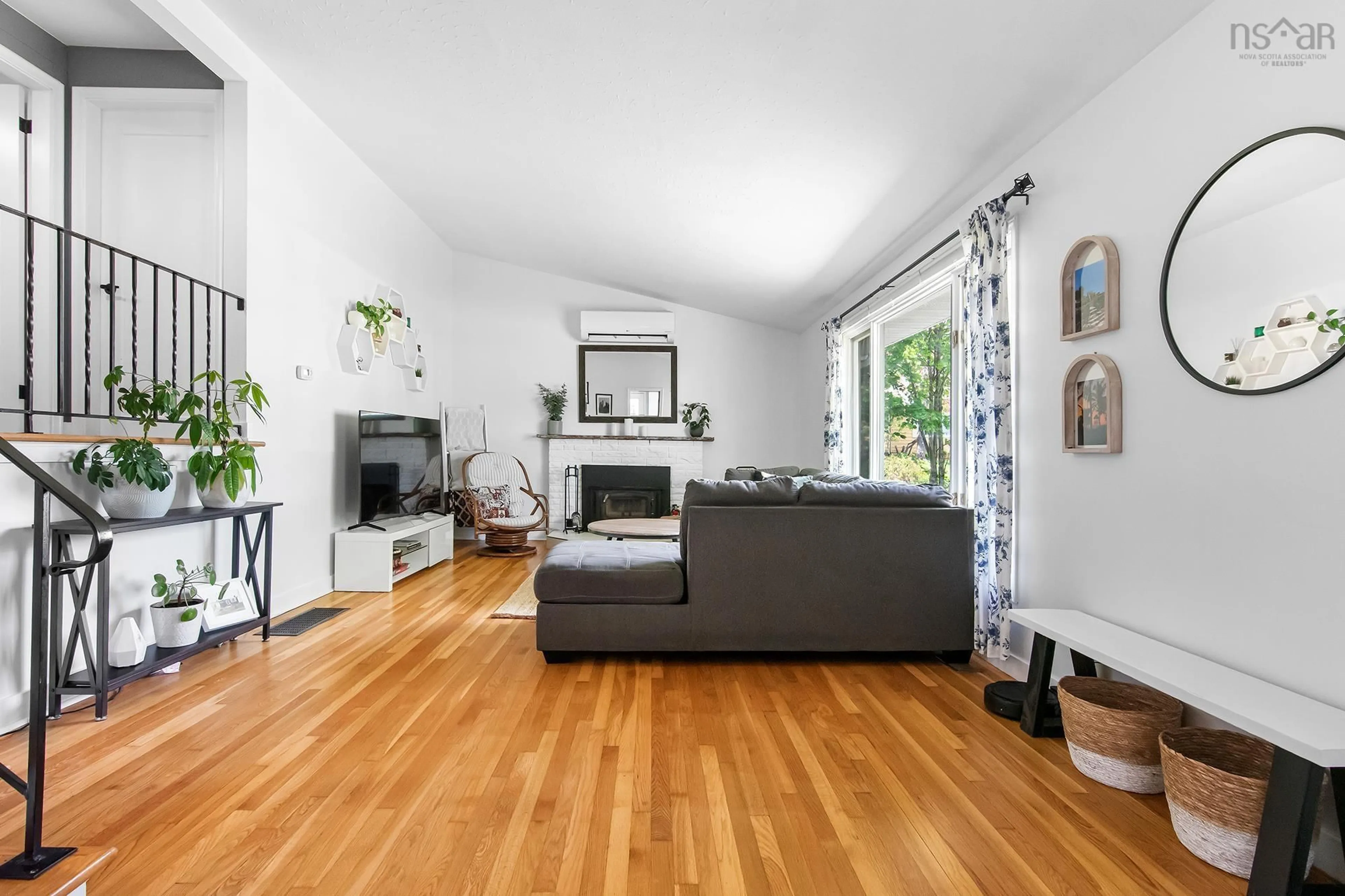 Living room with furniture, wood/laminate floor for 50 Canary Cres, Halifax Nova Scotia B3M 1R1