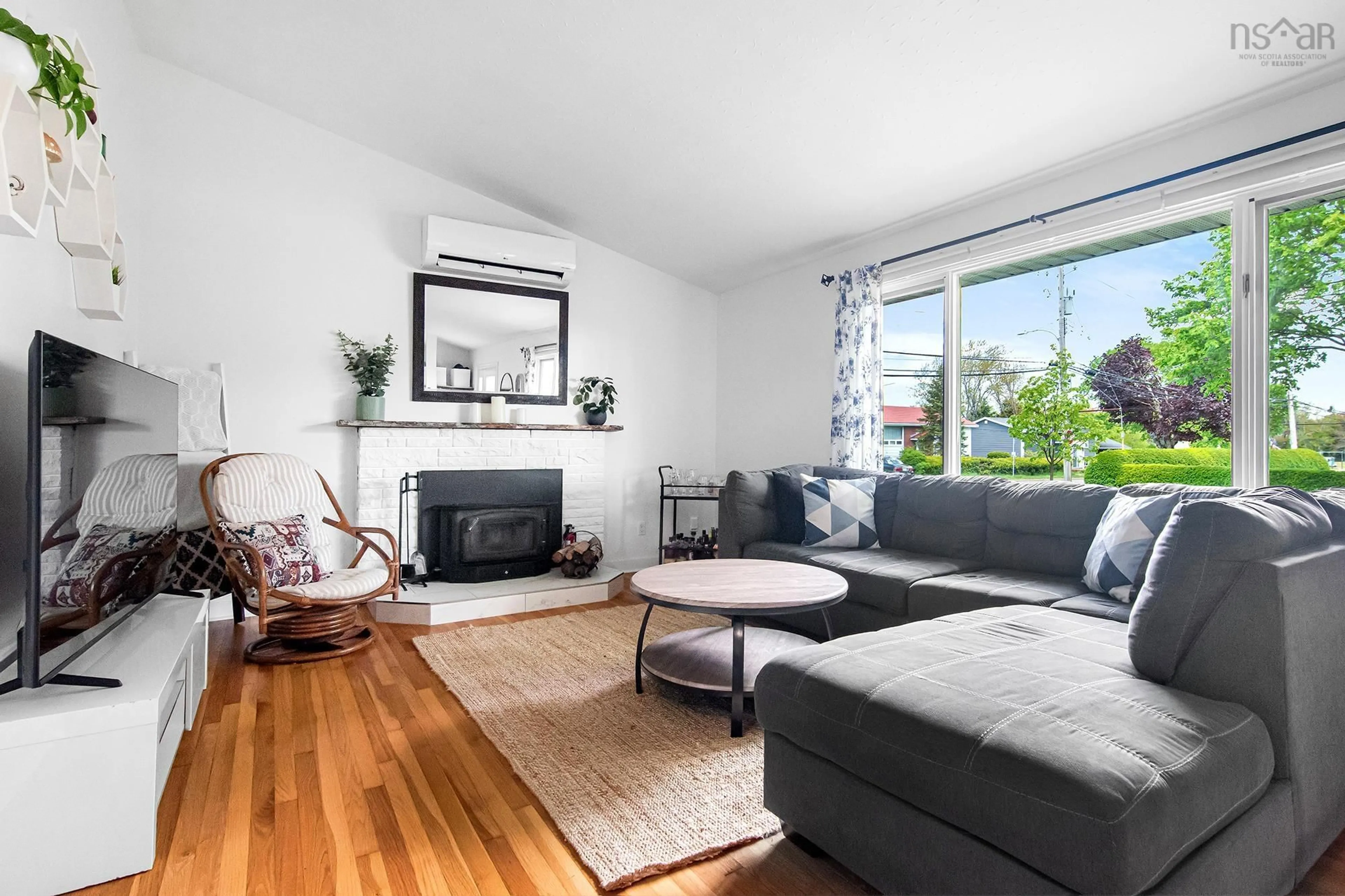 Living room with furniture, wood/laminate floor for 50 Canary Cres, Halifax Nova Scotia B3M 1R1