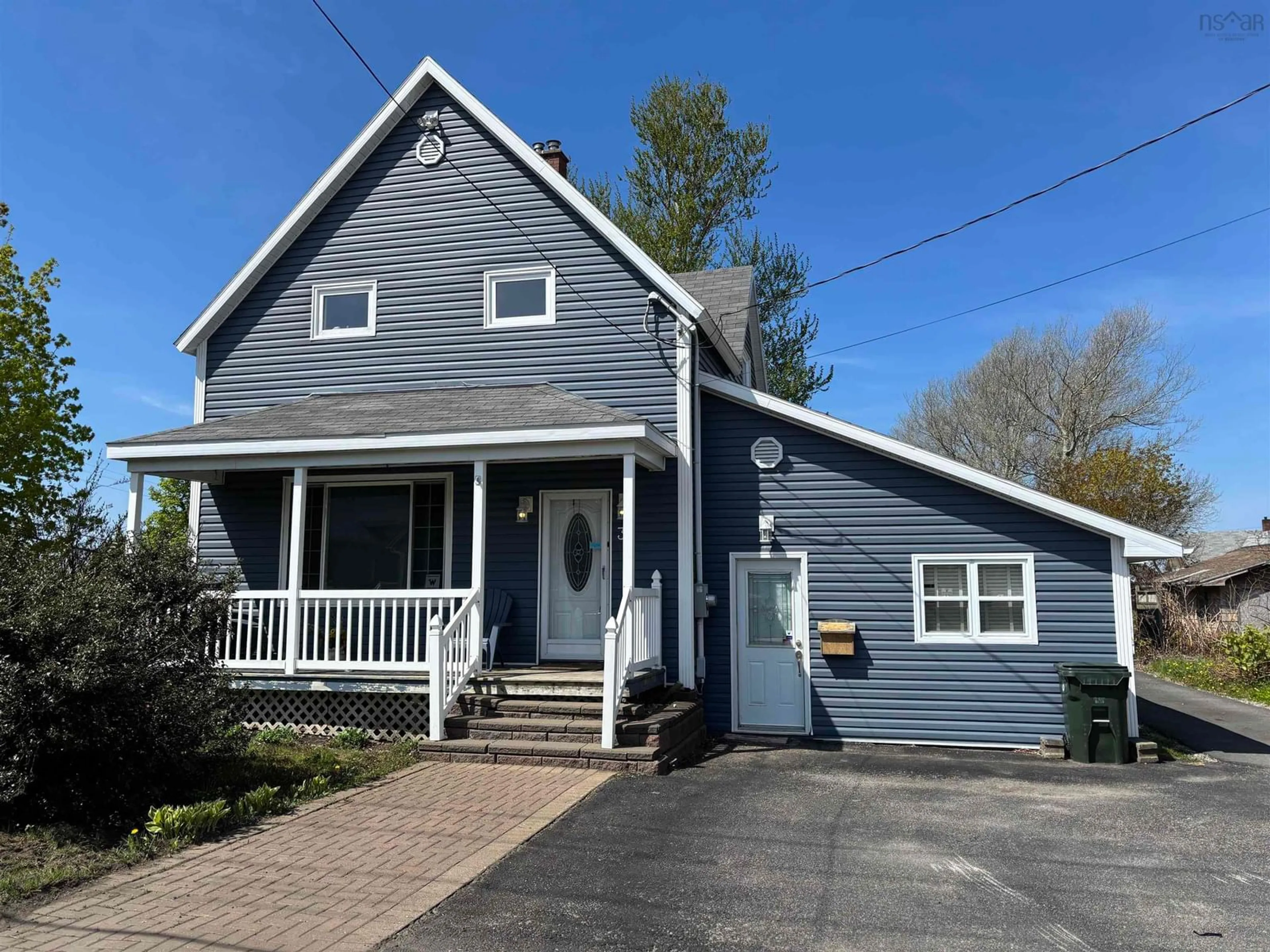 Home with vinyl exterior material, street for 30 Fraser Avenue, Sydney Mines Nova Scotia B1V 2B7
