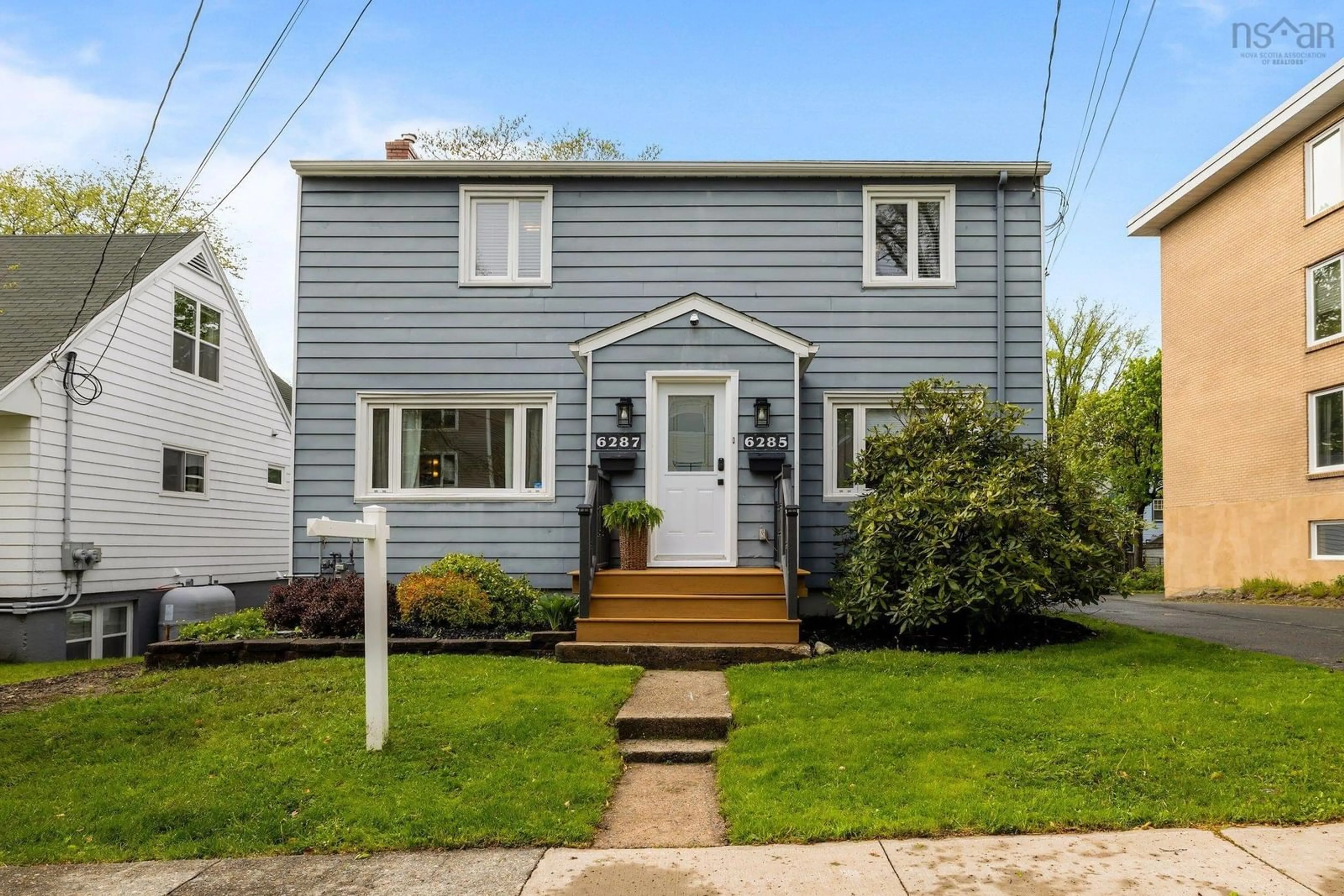 Home with vinyl exterior material, street for 6283-6285-6287 London St, Halifax Nova Scotia B3L 1W9