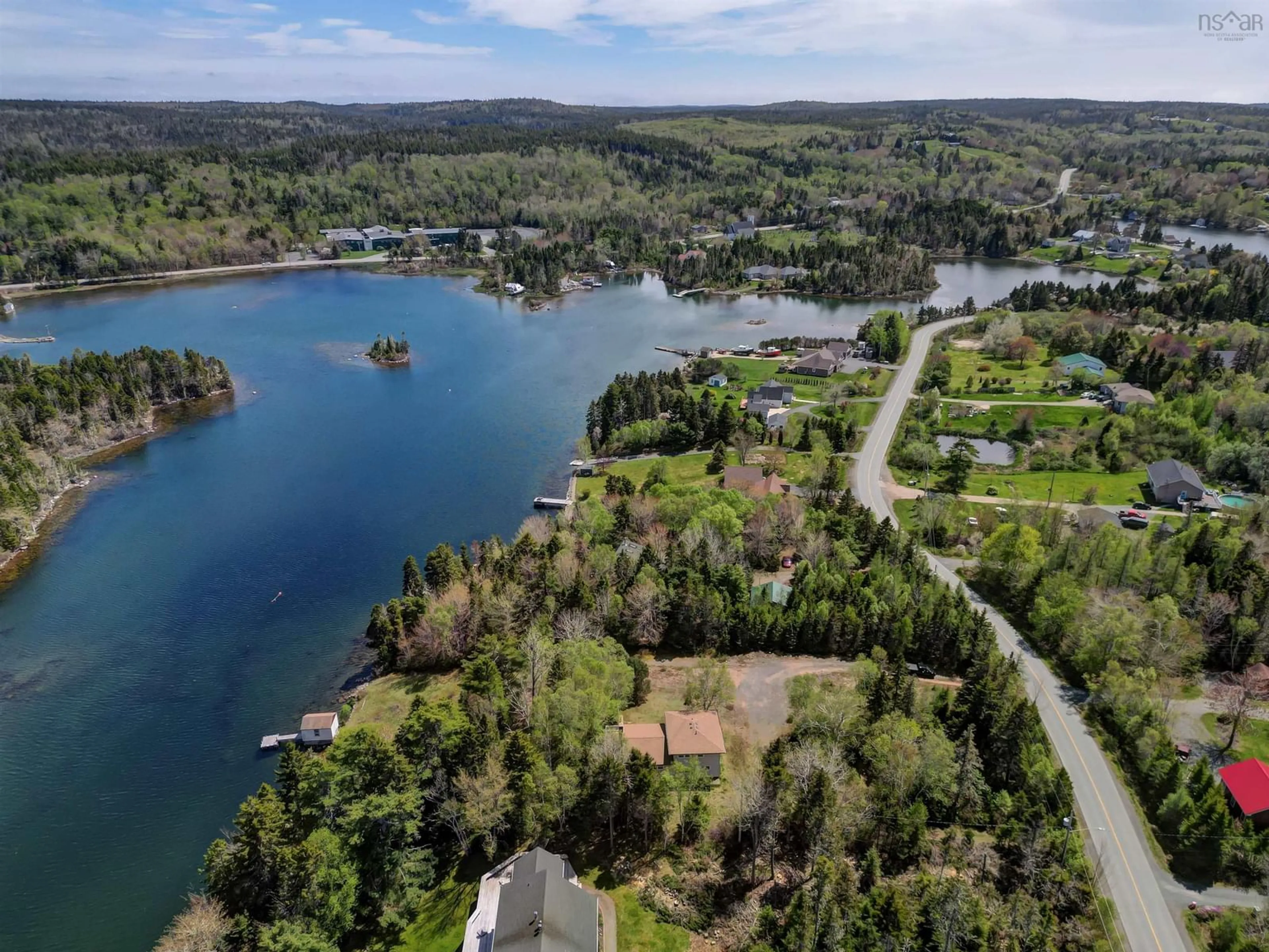 A pic from outside/outdoor area/front of a property/back of a property/a pic from drone, water/lake/river/ocean view for 217 Boutiliers Cove Rd, Hackett's Cove Nova Scotia B3Z 3J6