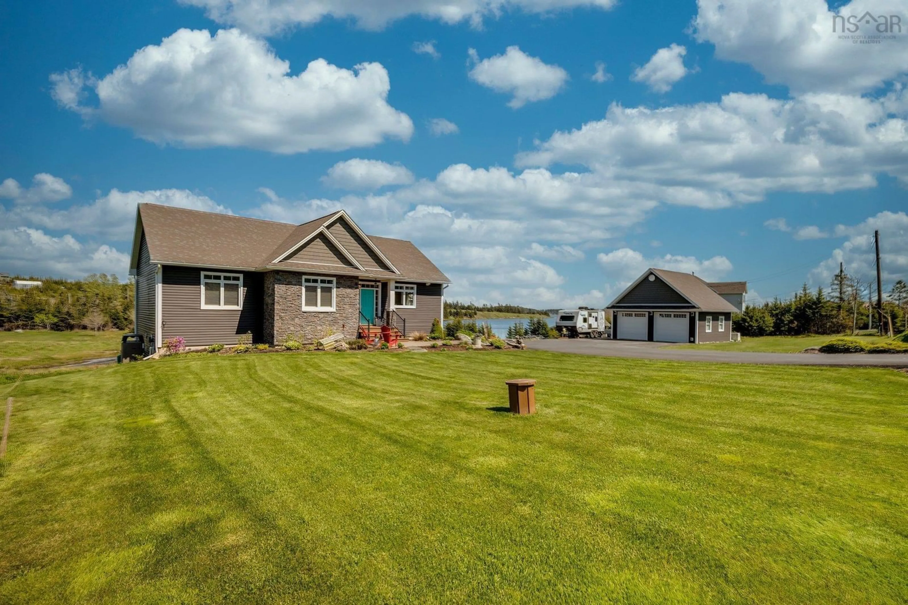 A pic from outside/outdoor area/front of a property/back of a property/a pic from drone, water/lake/river/ocean view for 124 Spruce Crt, Three Fathom Harbour Nova Scotia B0J 2L0