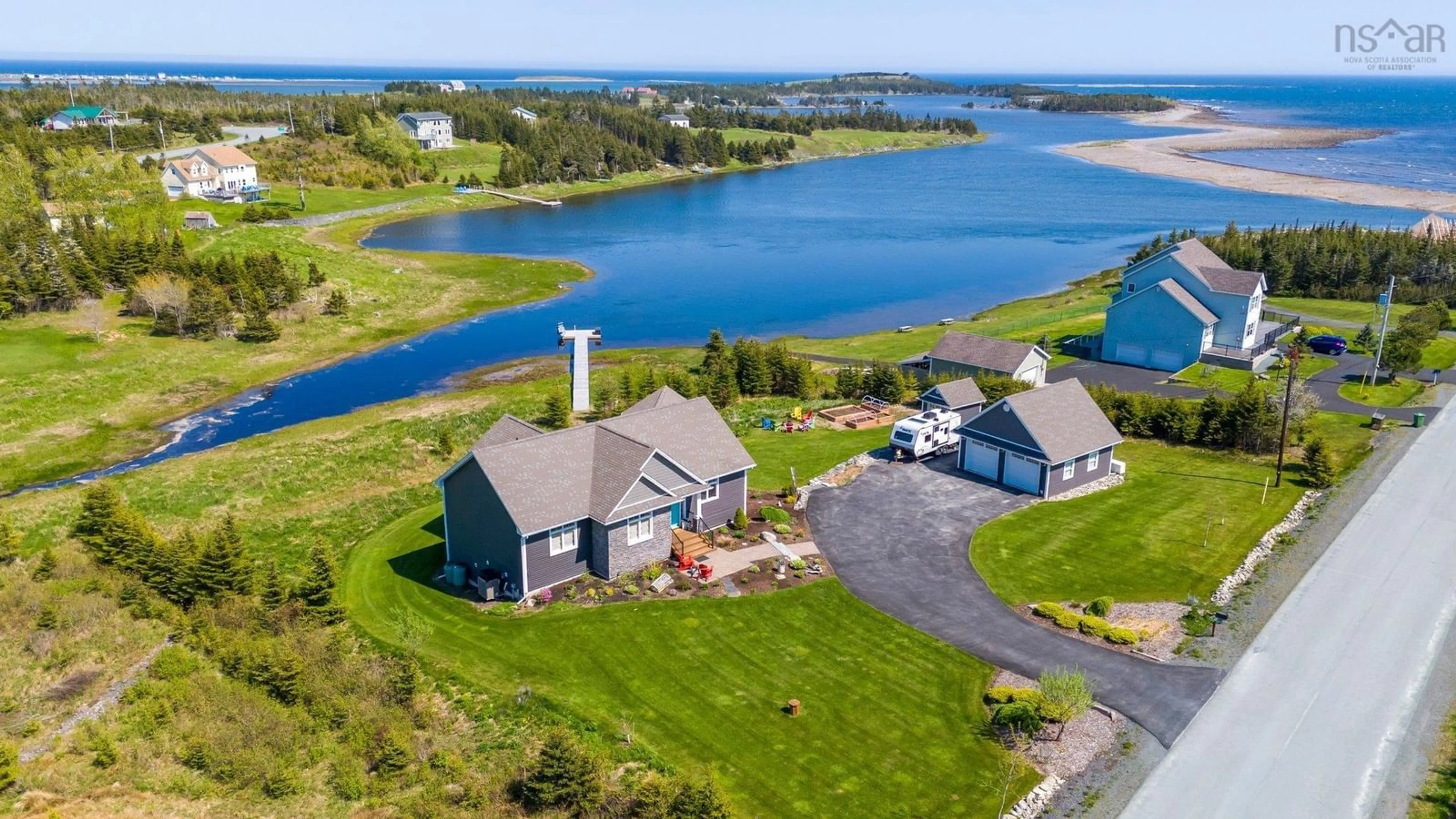 A pic from outside/outdoor area/front of a property/back of a property/a pic from drone, water/lake/river/ocean view for 124 Spruce Crt, Three Fathom Harbour Nova Scotia B0J 2L0