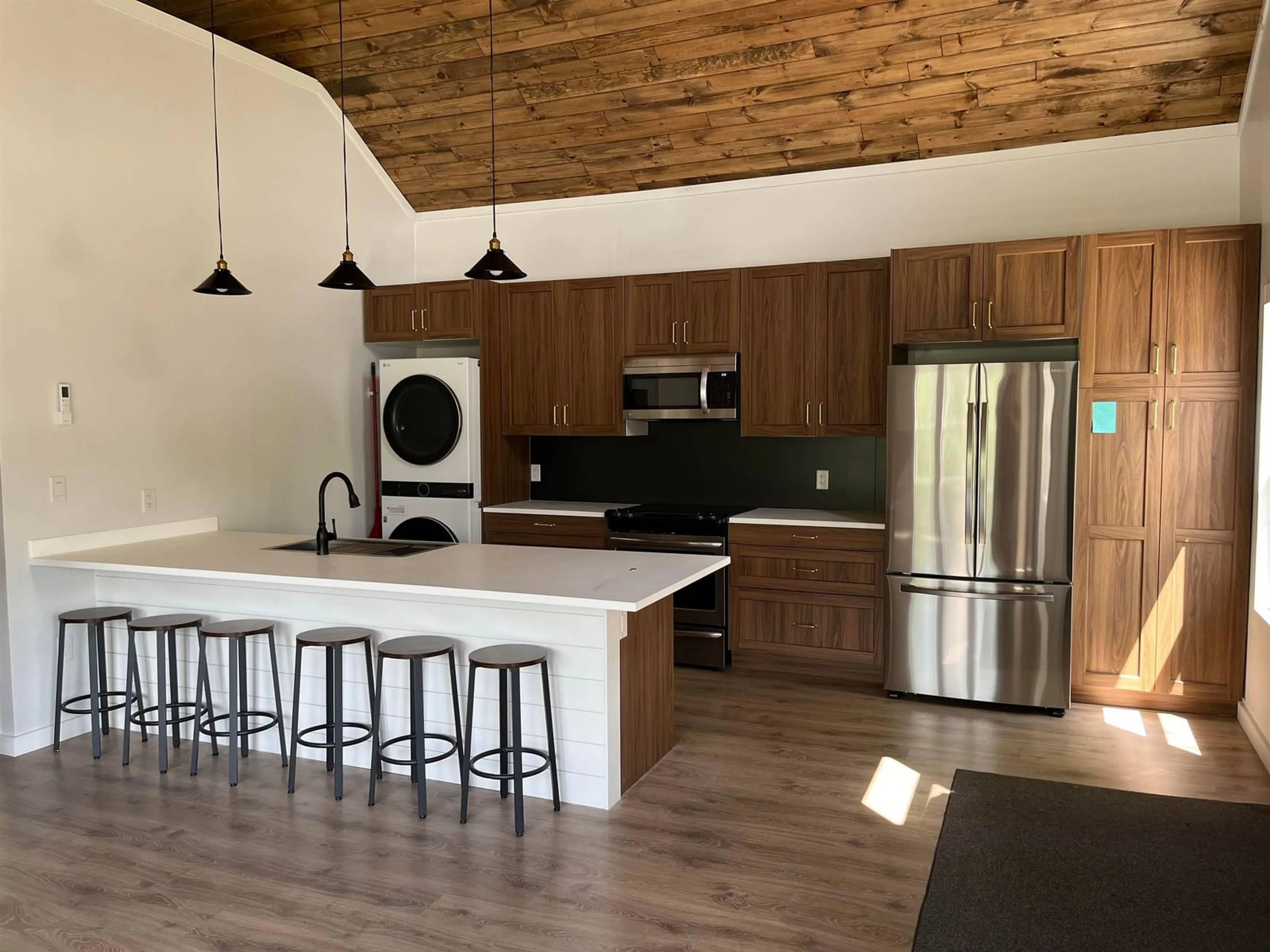 Open concept kitchen, wood/laminate floor for 2067 Highway 325, Whynotts Settlement Nova Scotia B4V 6M4