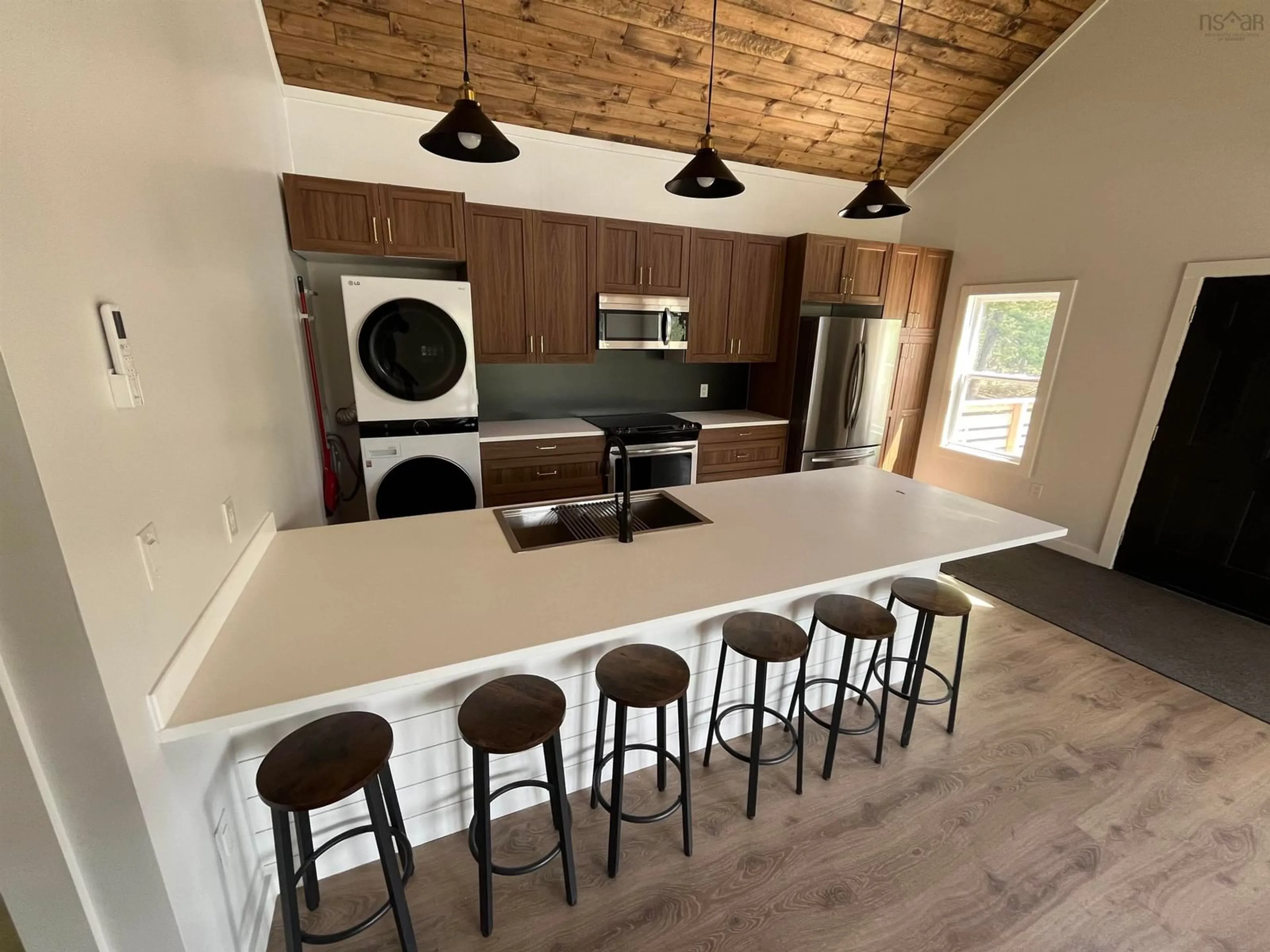 Open concept kitchen, wood/laminate floor for 2067 Highway 325, Whynotts Settlement Nova Scotia B4V 6M4