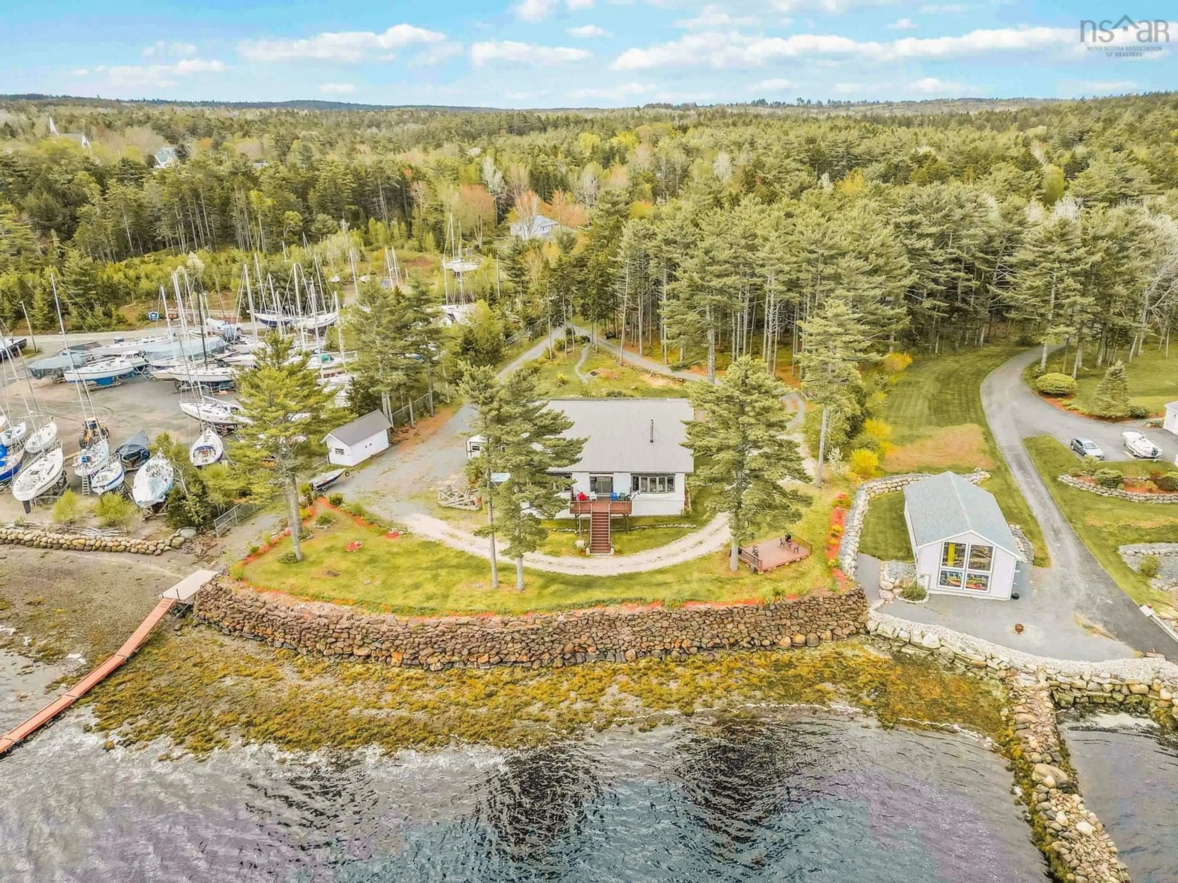 A pic from outside/outdoor area/front of a property/back of a property/a pic from drone, water/lake/river/ocean view for 39 Pernette Dr, West Lahave Nova Scotia B0R 1G0