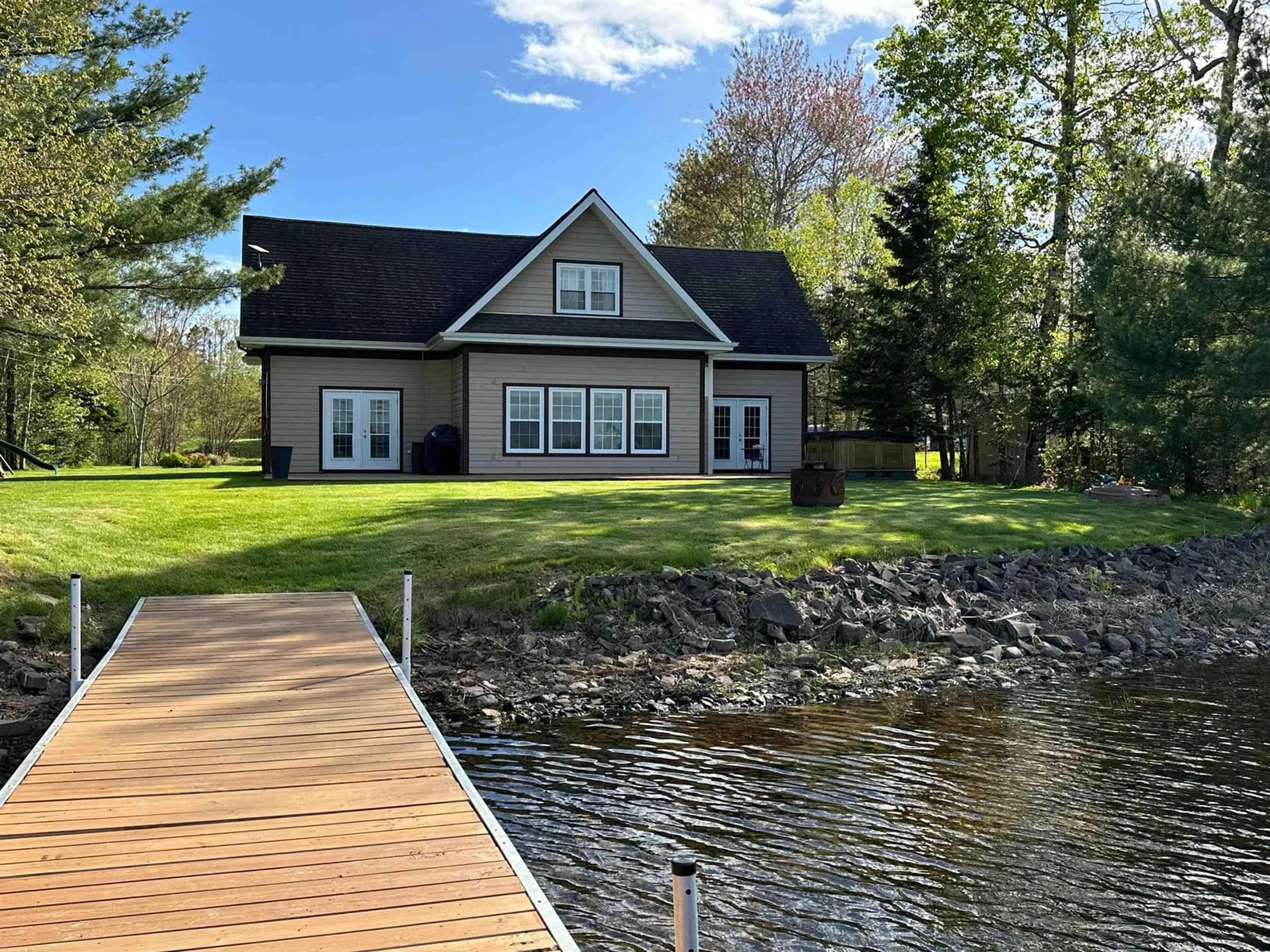 A pic from outside/outdoor area/front of a property/back of a property/a pic from drone, water/lake/river/ocean view for 390 A Stewart Rd, Shortts Lake Nova Scotia B0N 2J0